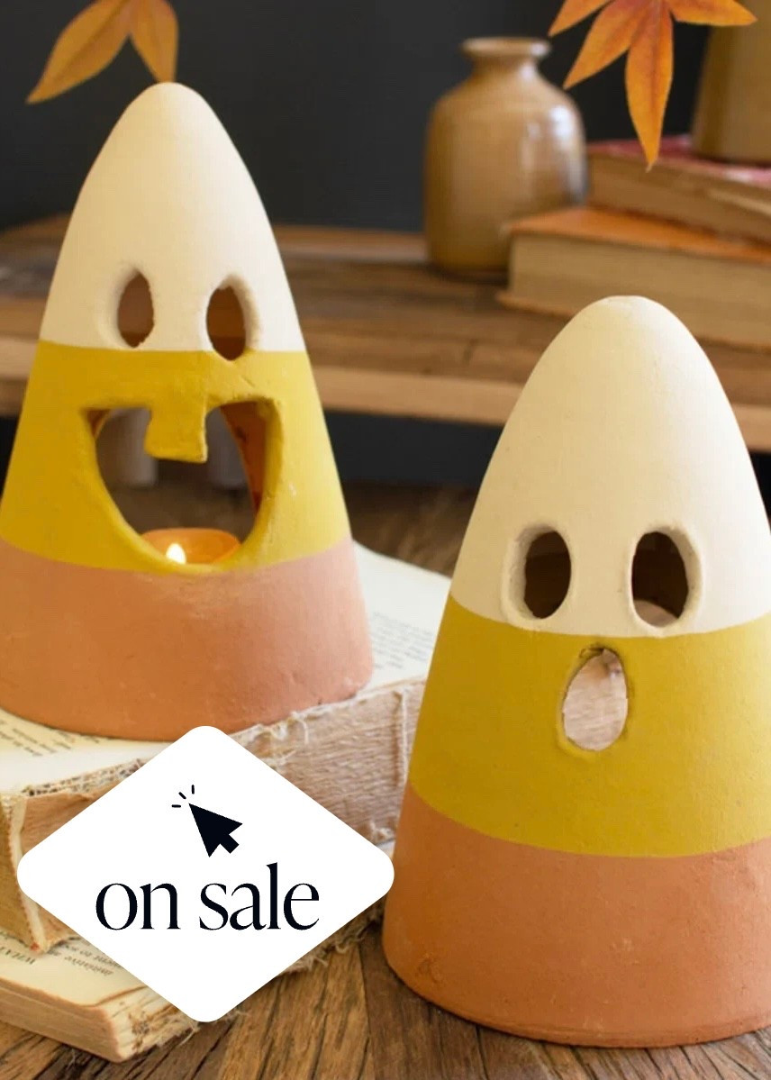 ✨SALE✨ Light up spooky season with the sweetest glow! 🍬🎃 This set of two candy corn lanterns is here to bring playful charm to your Halloween decor. Each 7” lantern features a candy corn character with a silly face that’s sure to make everyone smile. Just add a flameless tea light and let their cheerful glow set the mood for fright night fun!

#LTKHome #LTKSaleAlert #LTKSeasonal