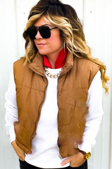 Winter outfits 
Cold weather outfit ideas
Camel vest
Red collar shirt
White sweatshirt
Black jeans
Gold necklace 
White leather sneakers
Fall outfits 
Winter outfits 
Amazon puffer
LuluLemon puffer

#LTKstyletip
