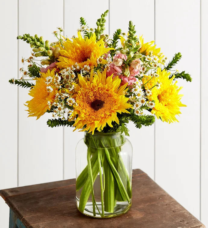 The carefree beauty of a sunflower field, captured in a bouquet. Our sunny gathering features sta... | 1800flowers.com