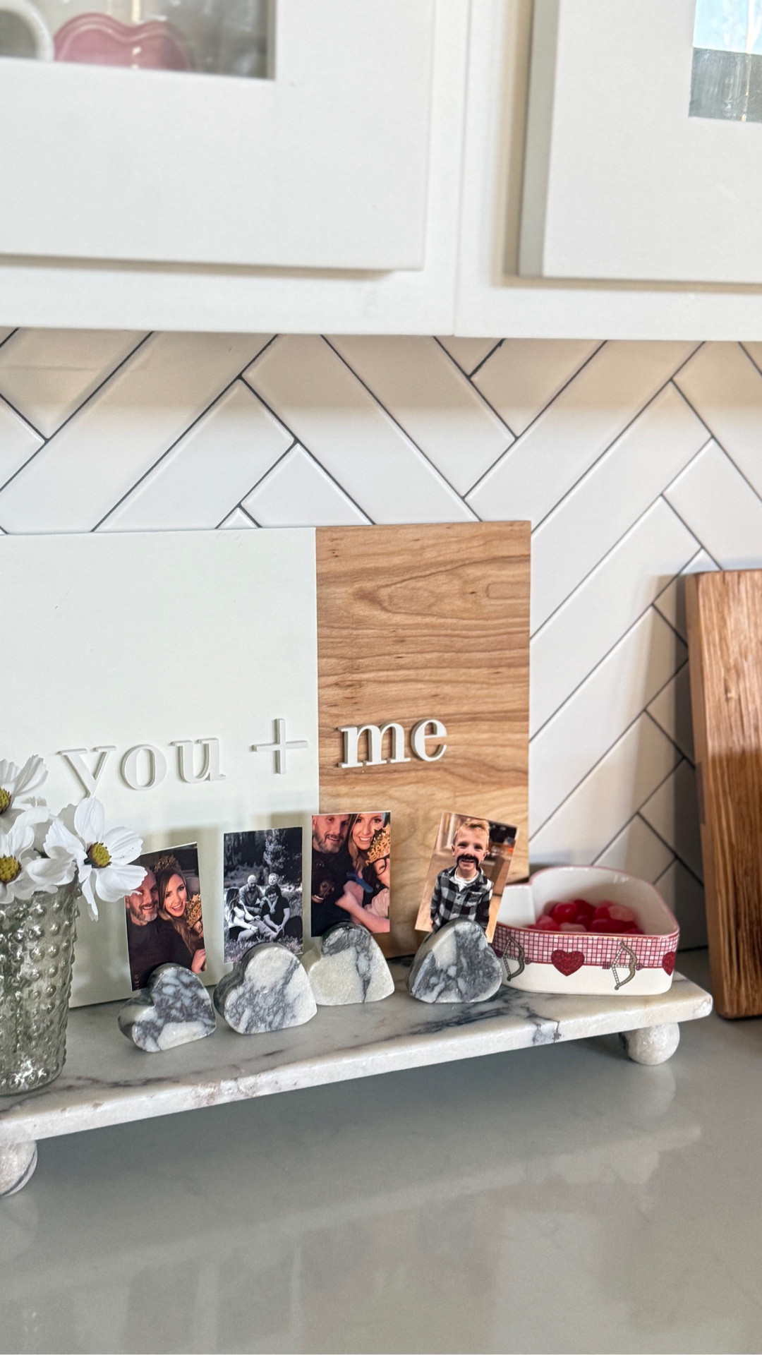 These marble heart name card holders ended up being the sweetest little photo stands. Perfect for mini prints, family photos, or seasonal moments you want out on display without feeling cluttered. Simple, meaningful, & easy to move around from shelf to shelf.

marble heart decor - marble photo holder - marble place card holder - picture stand decor - photo display ideas - family photo decor - sentimental home accents - neutral home decor - kitchen shelf decor - countertop styling - coffee bar decor - valentines home decor - everyday decor accents - modern classic decor - minimalist home styling - small decor details