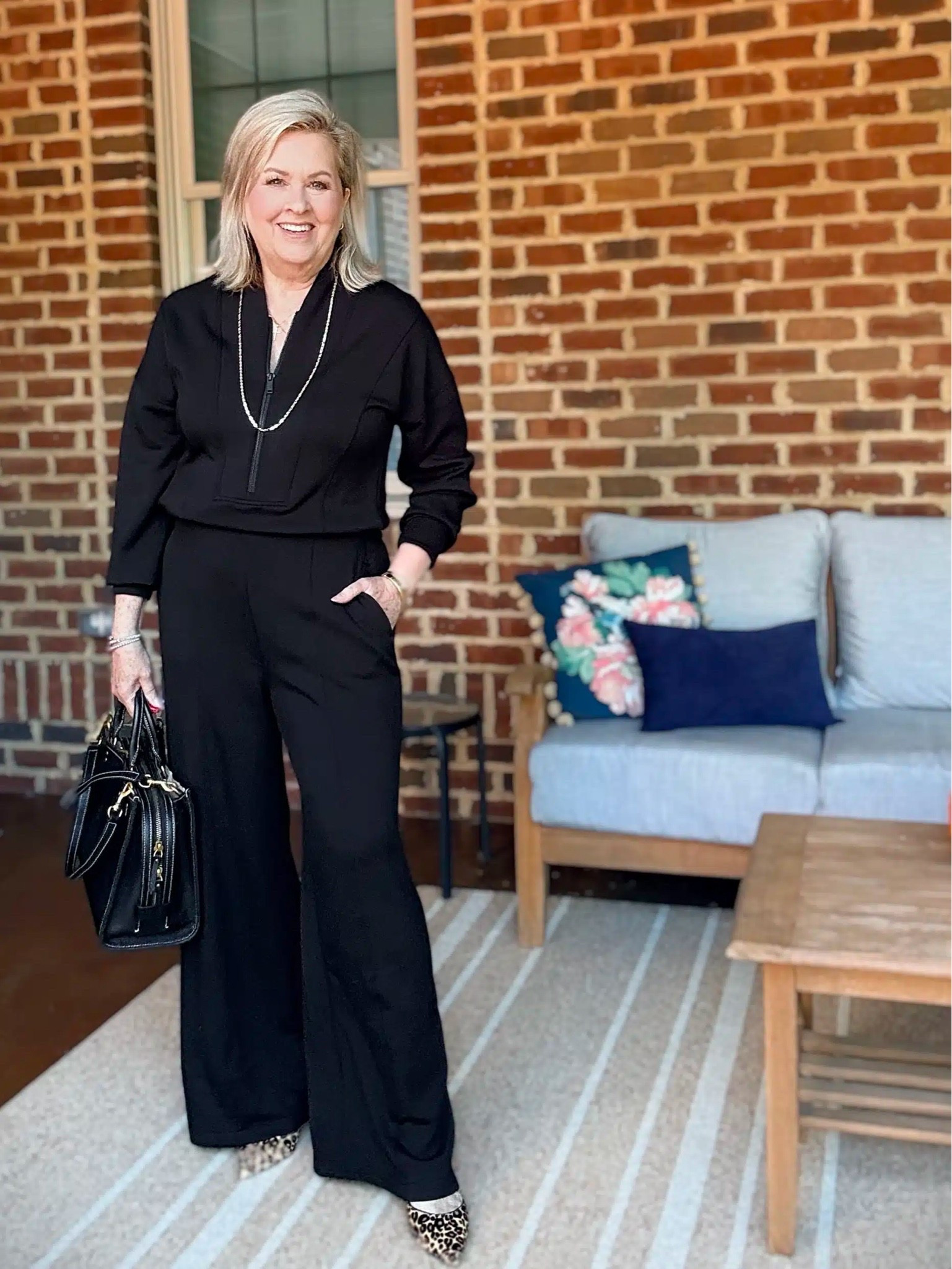 This Spanx Air Essentials long sleeve jumpsuit is a great piece to dress up or down. I love it in black, but it also comes in slate gray and a mushroom color. I’m wearing a medium and it fits great!