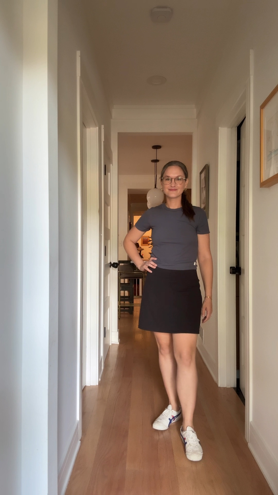 It’s a busy Thursday in August, and the city mom is all about effortless cool in a black athleisure skirt paired with a dusty blue athleisure top, her favorite sneakers ready for anything, while her go-to gold hoops, signature herringbone necklace, and new stack of permanent bracelets add just the right sparkle. After dropping her son off at daycare, she’s off and running—zipping from physical therapy straight to a business meeting at a café, catching up on emails, posting two new blog posts, and ticking off all the little tasks that keep her blog humming. By evening, she trades her laptop for laughter and conversation over dinner with friends she hasn’t seen in a month, still chic, still put-together, and somehow managing to make even chaos look effortless.

#LTKStyleTip #LTKActive #LTKShoeCrush