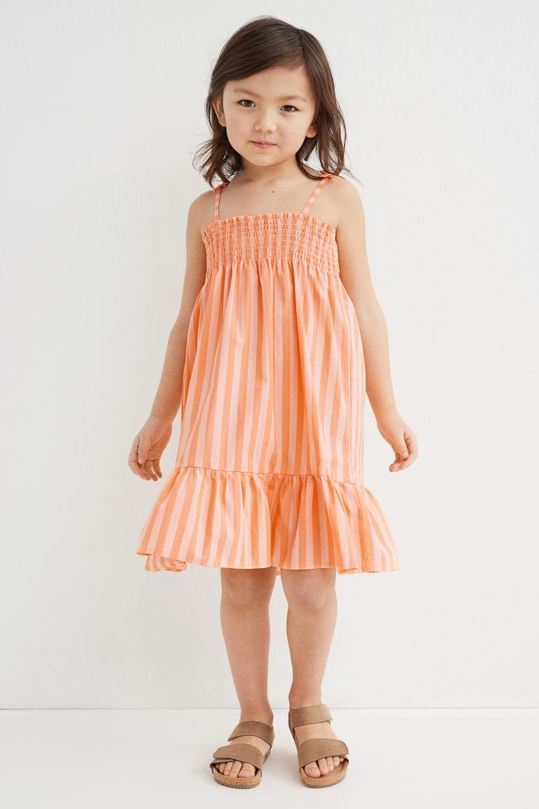 A-line dress in an airy cotton weave with smocking at the top, narrow shoulder straps with a deco... | H&M (US + CA)