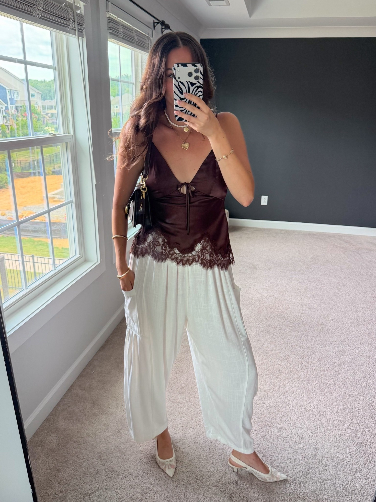 5’9” wearing size small brown satin lace tank, size medium linen barrel pants, 7 lace kitten heels.

#LTKootd #LTKTall