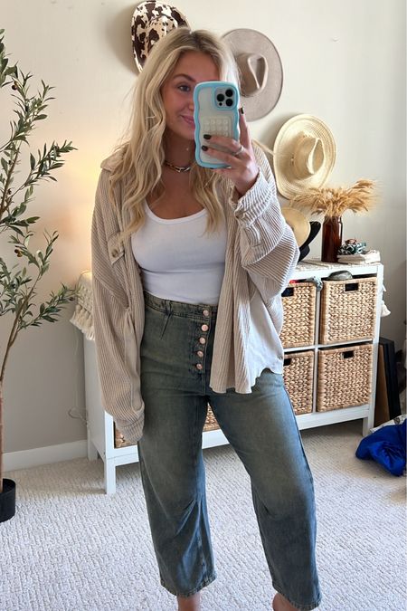 Wearing a 28 in the jeans, they are so stretchy and comfortable size down 1 to 2 sizes. Wearing a medium in the shacket. It’s the perfect fall staple great for layering lightweight really comfy wearing a medium in the tank top from Amazon. Such a good basic and staple and really affordable. 