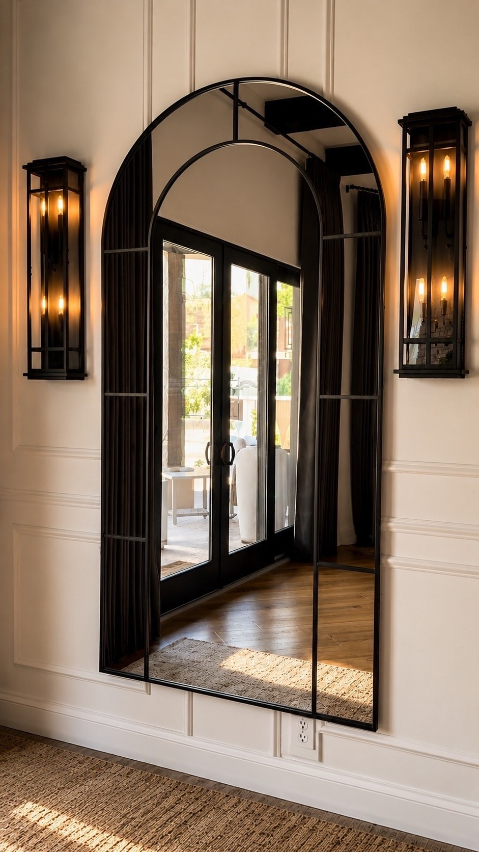 Sometimes it’s the simplest updates that make the biggest impact. 🥂

I’ve always loved the look of oversized arched mirrors, but seeing this one styled here really reminded me how much they can transform a room. 

Not only does it make the space feel larger and brighter, but it also adds so much architectural interest and depth. Between the black metal frame, the reflection of natural light, and the way it complements the wall molding, it instantly creates that elevated designer look.

Arched mirror
Oversized mirror
Entryway decor
Interior design
Luxury home decor
Neutral home inspo

Summerthompsonstyles

#LTKHome #LTKSaleAlert #LTKdayinmylife