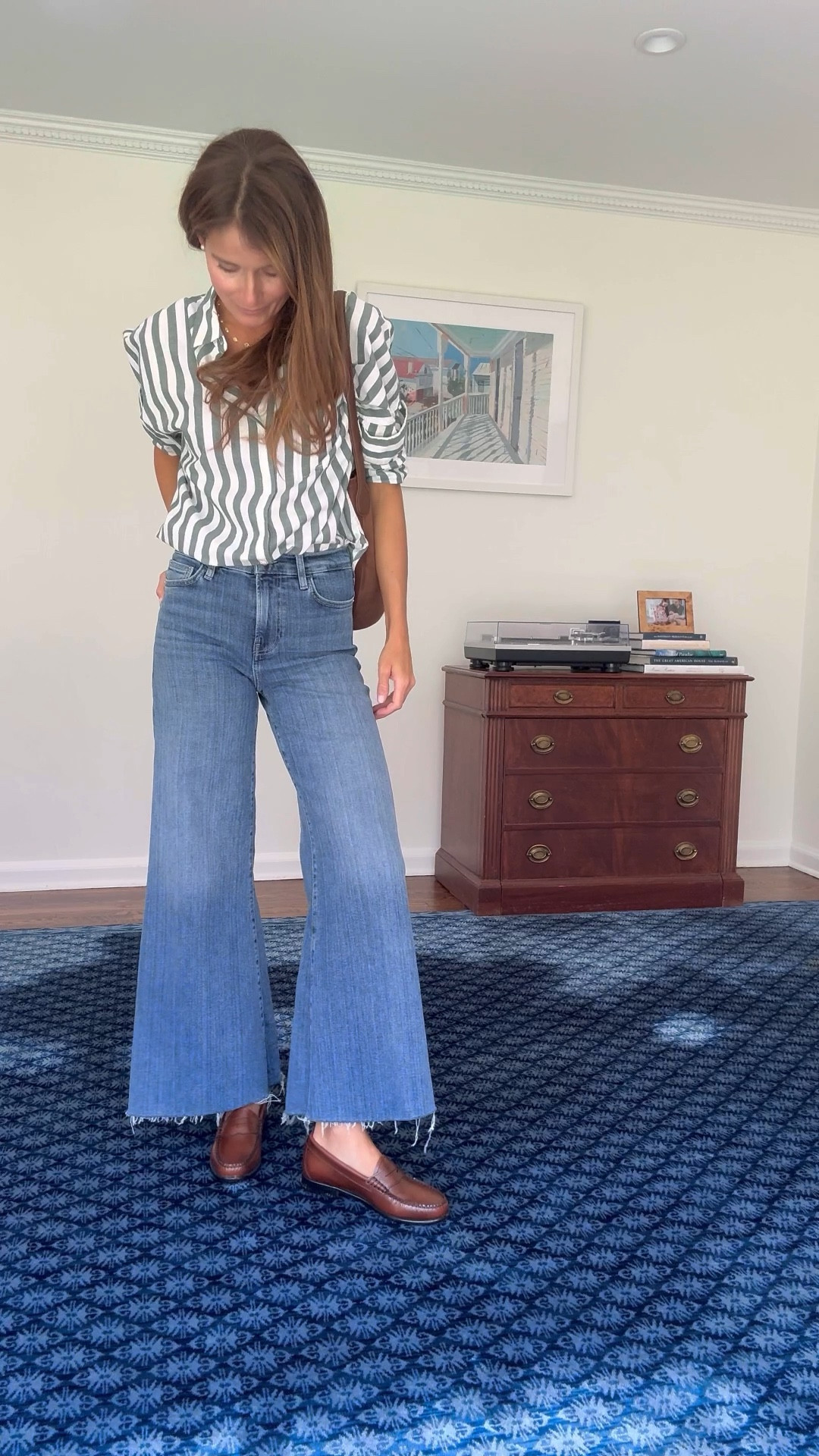 tuesday ootd 〰️ back to business 📓🍂✨

Sizing notes: 
shirt: wearing a size small 
jeans: wearing my true size, a 26. Go up if you are between! 
Loafers: wish I had sized downc1/2 size! 

#LTKStyleTip #LTKVideo #LTKSeasonal