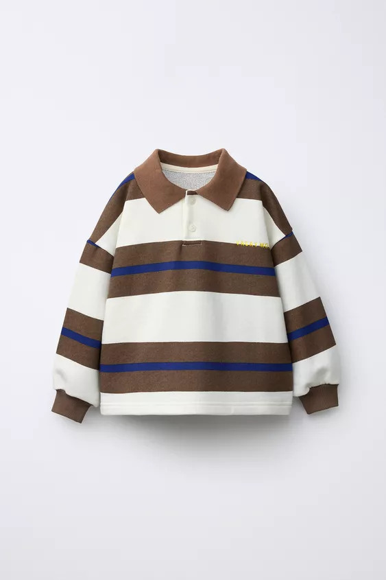 Sweatshirt with polo collar and long sleeves with ribbed trim. Button closure at yoke and striped... | Zara US