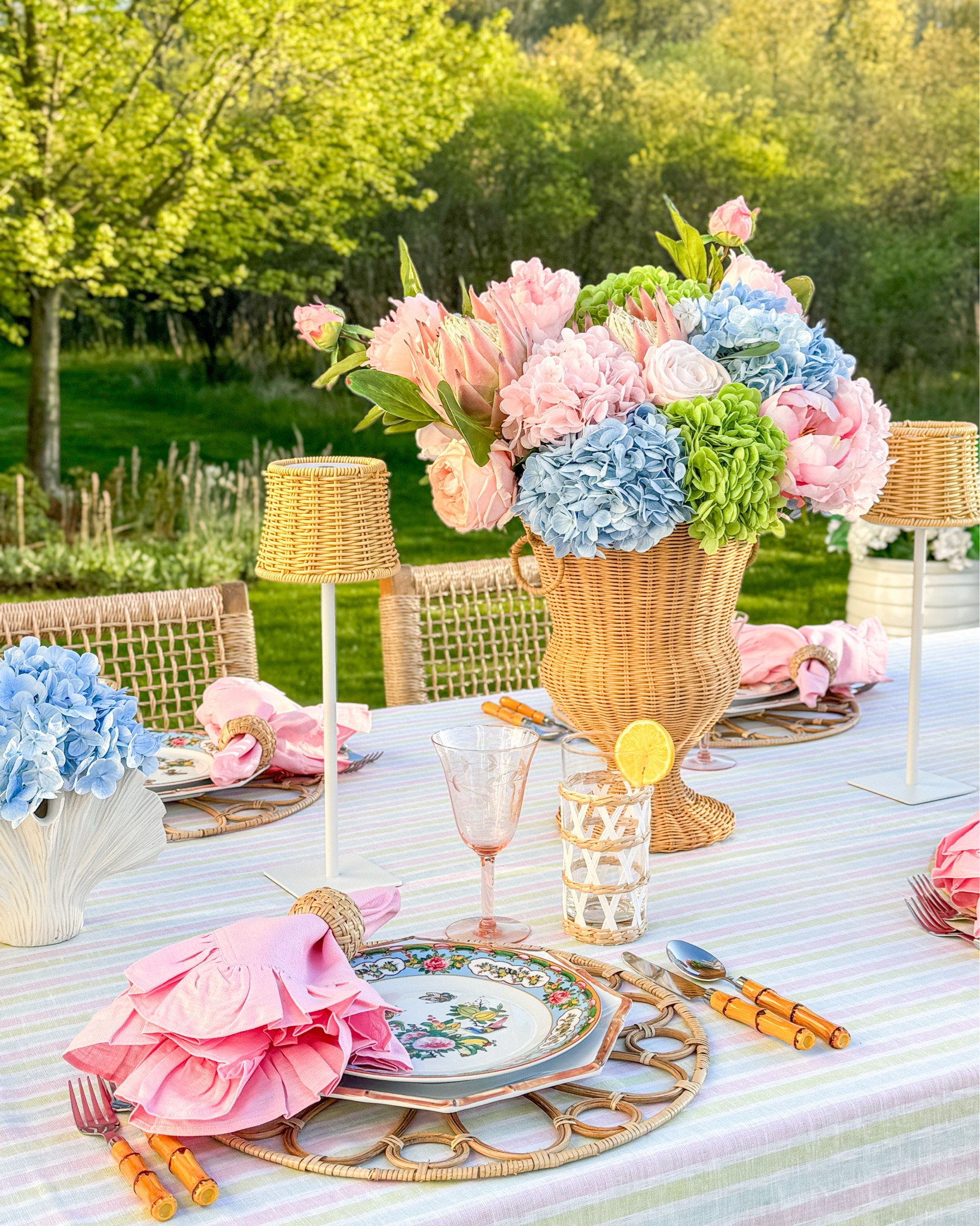 Shop my “Palm Beach Paradise” summer tablescape featuring linens from Solino Home! #ad

Woven urn, rattan urn, rattan lamps, table lamps, woven chargers, ruffle napkins, pink napkins, pink glassware, woven glassware, shell vases, blue hydrangeas, pink hydrangeas, green hydrangeas, pink peonies, Amazon flowers, faux flowers, famille rose, coastal style, coastal tablescape, summer table, summer entertaining, tropical style, bamboo flatware, striped tablecloth, centerpiece ideas

#LTKParties #LTKHome #LTKSeasonal