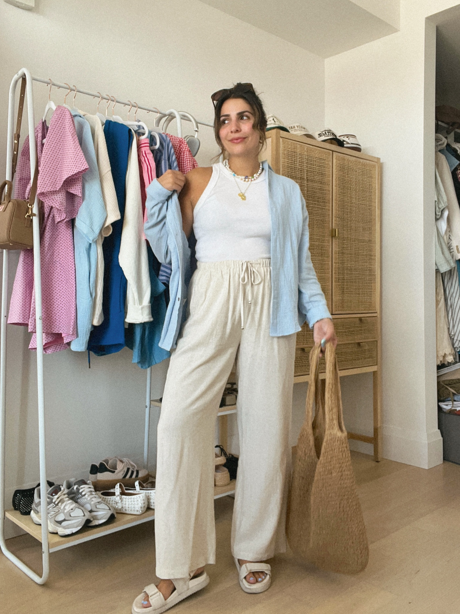 Another blue + tan combo! This feels so coastal and chic, I love it. These wide leg pants are one of my fave amazon purchases ever - super comfy waistband and not too long (i'm 5'4)

Added my go to high neck tank + an oversized button down. Wearing all true to size, M! 

#LTKSummerSales #LTKFindsUnder50 #LTKSeasonal