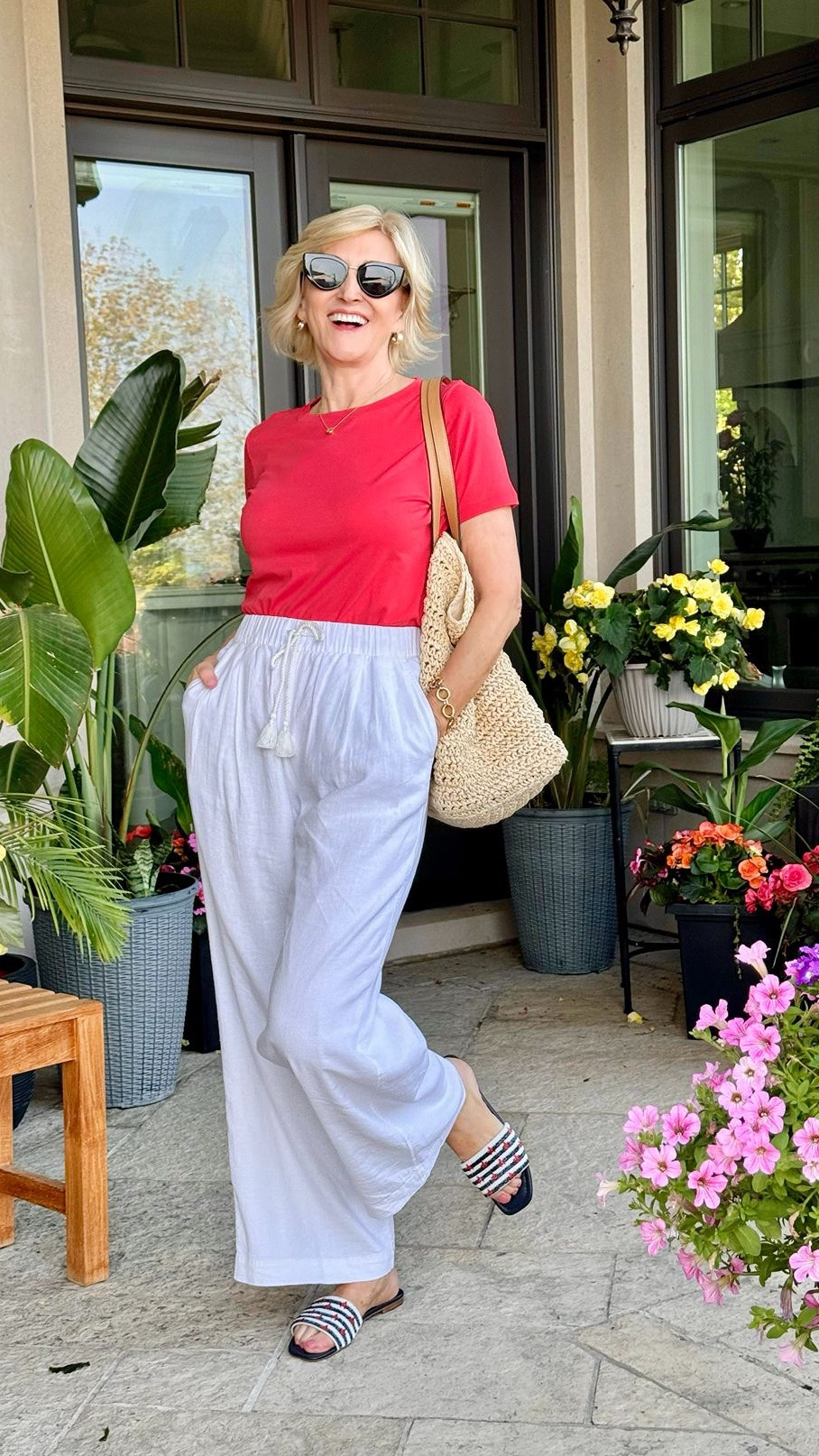 Some outfits just feel like summer the moment you put them on, and this red tee with white linen pants is exactly that kind of combination.

I love how simple this look is—just a bold red shirt paired with breezy white linen pants and easy slides. It’s comfortable, relaxed, and still feels really pulled together without any effort. That’s my kind of everyday style.

I know many women start to gravitate toward neutrals as they get older because they feel “safer,” but I’ve actually found that adding a pop of color like red can completely change how an outfit feels. It brightens everything up and adds a little confidence boost at the same time.

Debs style takeaway? Keep the base simple—like crisp white linen—and let one strong color do the talking. It’s an easy formula that always feels fresh and modern. ❤️✨

#LTKSeasonal #LTKOver40 #LTKootd