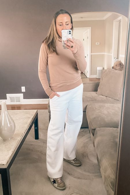 These are the sweatpants I love from Aritzia. They have a wide leg boyfriend look. The material is thick and comfy. Really like the fit. Wearing a size small. 

#LTKtravel #LTKsalealert #LTKfindsunder100