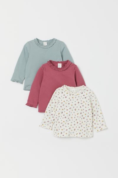 Long-sleeved tops in soft cotton jersey with gathered ruffle trim at neckline and cuffs. | H&M (US + CA)