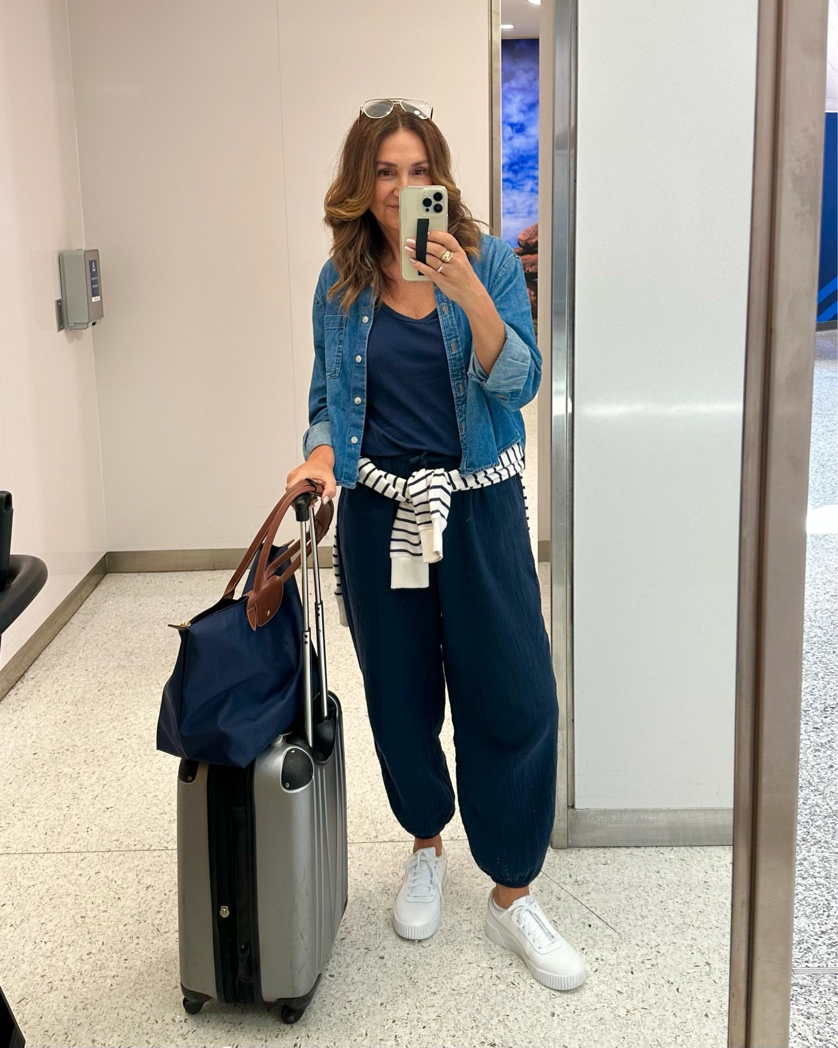 Travel outfit!
Love how comfy these pants are and a matching tank makes it look a bit more elevated.
Comfy sneakers and layers for the cold plane are a must!
I’m 5’ 7” wearing my usual size S in everything.

#LTKOver40 #LTKootd #LTKTravel