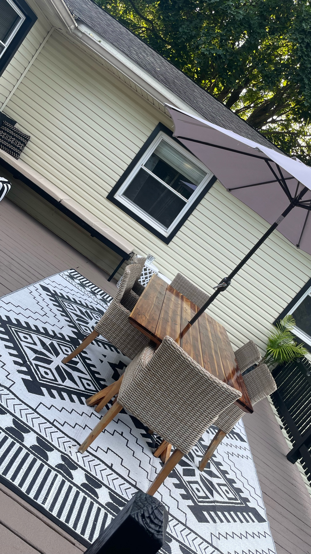 Deck Remodel 🔅
⸻
Modern Deck Refresh — All DIY & Under $1,000!
Who says you need a big budget (or a contractor) to love your outdoor space? We completely updated our deck with a fresh, modern look — all for under $1,000 and entirely DIY.

We:
	•	Sanded + restained the decking for a cleaner finish and added rustoleum Rock Solid paint
	•	Painted our existing railings a crisp black using exterior paint from Lowe’s (so much cheaper than replacing them!)
	•	Built in a seating area and repainted and cushioned the space 
	•	Layered in cozy, affordable outdoor rugs + lighting
        •       Sanded and stained the stairs and added support underneathh

Everything was done with a few days of work, a few power tools, and lots of coffee. Now it feels like an entirely new space without draining our savings.

Linked all our affordable finds so you can recreate it, too! #deckmakeover #budgetfriendly #diyhome #outdoorliving