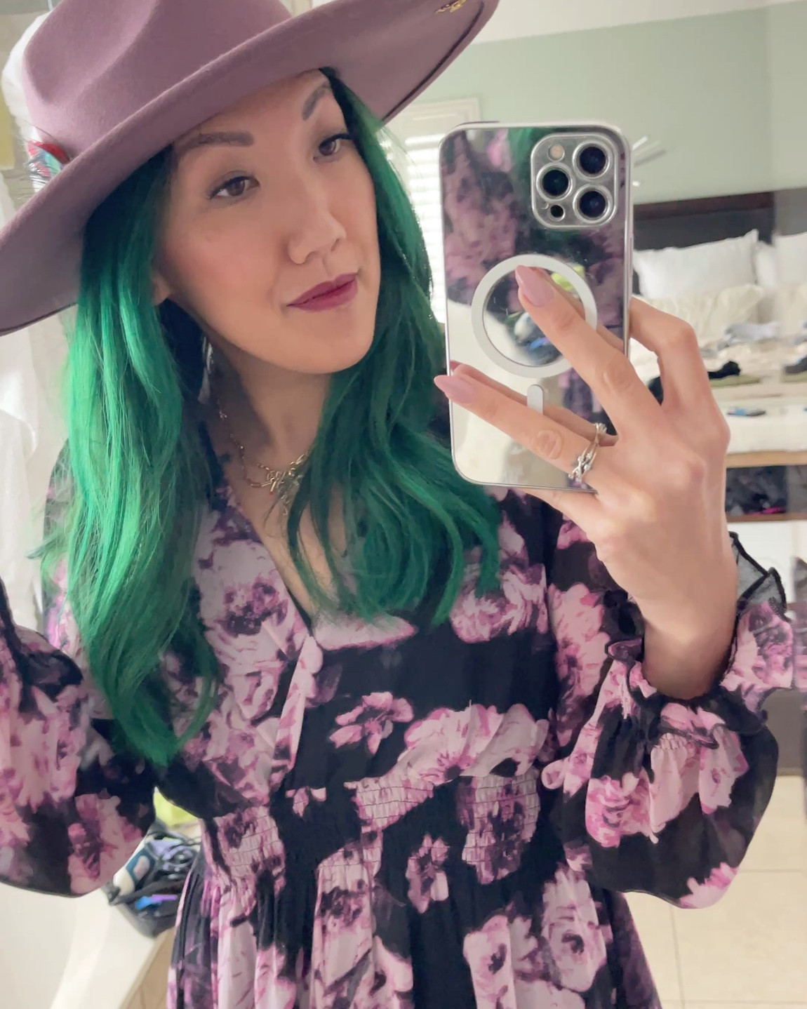 We went to a wedding over the weekend! The attire was casual country western so of course I needed to wear my boots and felt hat. Peep the matching metallic pink boots I found for my daughter to match me! These shiny pink boots will take us through the rodeo/festival season too! 
My wedding guest dress is black with pink florals to match the boots. (The exact dress style is linked but this floral print isn’t available anymore- the dress comes in several floral prints perfect for any special occasion. It’s chiffon with a stretchy bodice so I was comfortable all night. 

I brought a mini version of my makeup stak along with me for quick touch ups on the go at the wedding. This stack includes tinted lip balm, lip and cheek, shine control powder and of course the mirror and brush base. This would be such an incredible bridesmaid gift to your bridal party! 

The Stak can be customized to suit your makeup preferences and everything fits into a compact stak with a mirror and mini brush. I like to use that brush for my highlighter! ✨ The retractable full size blush is what I use mostly for everything else. (TIP: Add a dry brush cleaner to your cart to clean your makeup brush between colors/products.)

#LTKWedding #LTKStyleTip #LTKBeauty