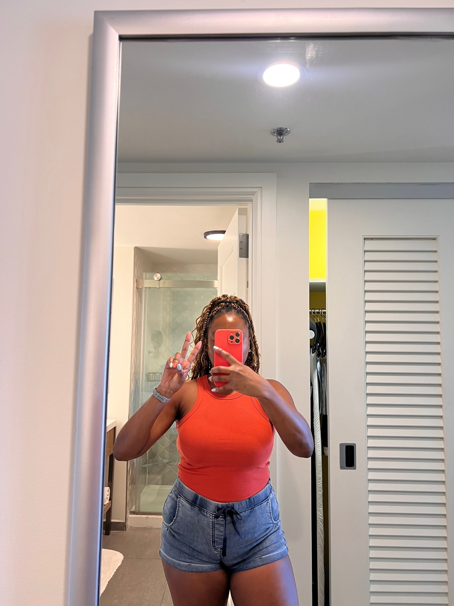 Mirror check during my stay at the Renaissance Wind Curaçao Resort ✌🏾 Loving this comfy, casual look for exploring the island. I kept it simple with a bright orange ribbed tank top, high-waisted denim shorts with a drawstring waist, and easy travel accessories. Linking my outfit details + travel must-haves so you can shop the look and pack light for your next getaway. 🌴✨ 

#CuracaoTravel #VacationStyle #OOTD”


#LTKFindsUnder50 #LTKTravel #LTKSeasonal