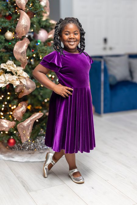 This purple velvet dress is one of our favorites from Florence Eiseman. Its stretch fabric makes it easier for my daughter to move around. The flutter sleeve and bow add fun details too!
#kidsfashion #trendydresses #holidaylook #modeststyle

#LTKstyletip #LTKHoliday #LTKkids