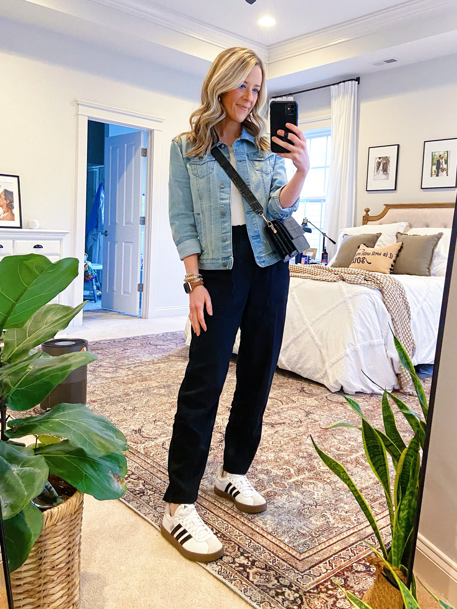 Casual mom outfit for spring. 

Jean Jacket: Walmart Find (XS)
White Tank: Target (S) I prefer to size up one in these for length
Tapered Trousers: Target (XS) Elastic waistband makes these very comfy. 
Black Crossbody Bag: Amazon Find
Neutral Sneakers: adidas VL Court (TTS) 

Elevated Mom Style | Elevated Casual | Casual Workwear | 30s Mom Style | Classic Style | Trouser Outfit | Neutral Sneakers | Walmart denim jacket | Affordable Spring Outfit | Mom Outfit

#LTKfindsunder50 #LTKstyletip #LTKfamily