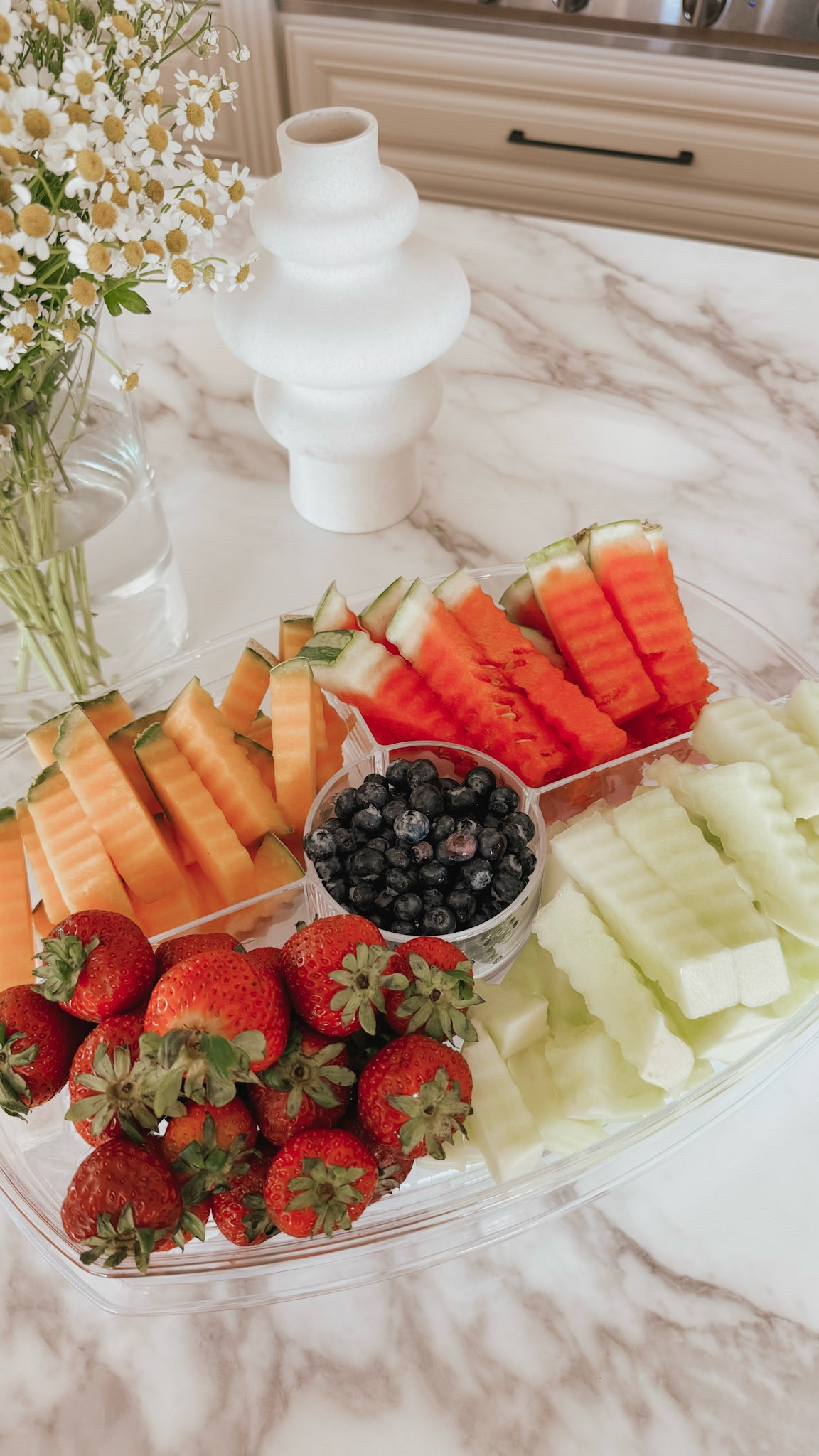 This ice serving tray is perfect for hosting parties and I love how the crinkle cutter makes this fun fruit fries look 😍 The middle can also be used for a fun dip!

#LTKHome #LTKSeasonal