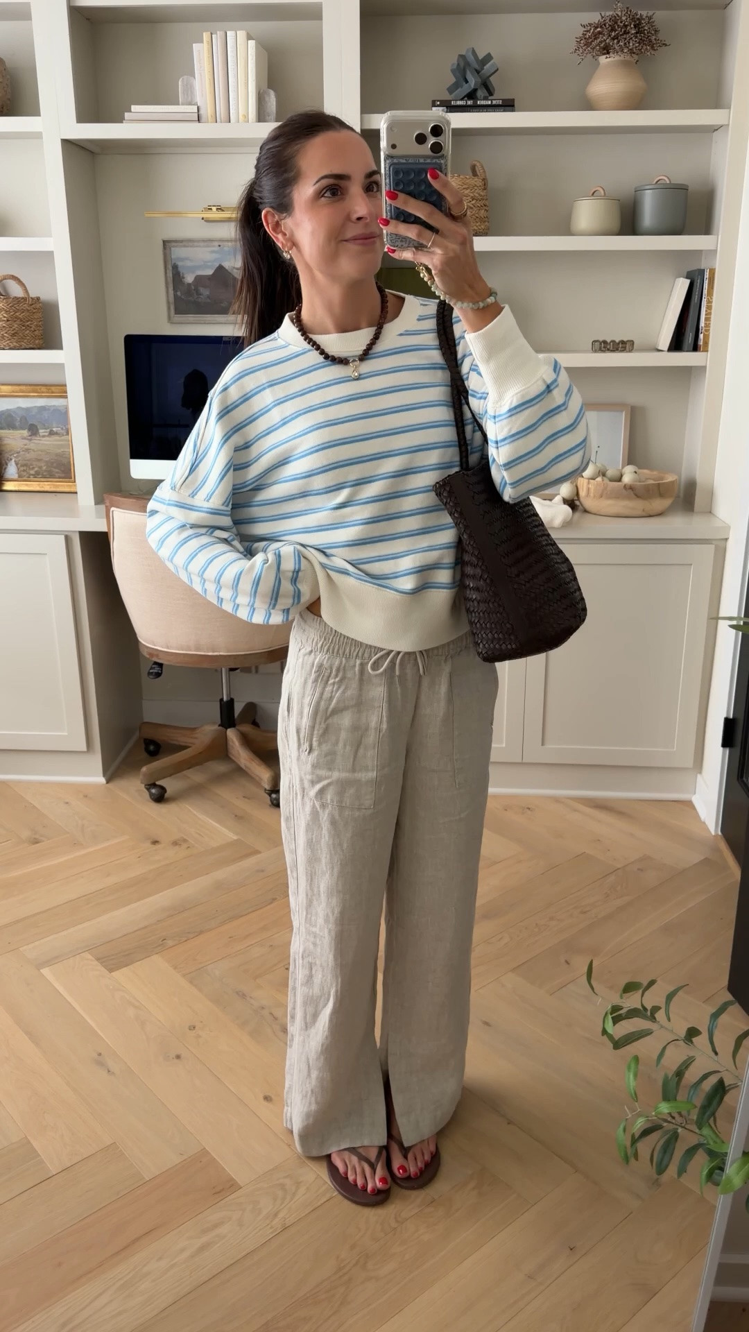 OOTD for a chilly AM baseball game ⚾️ 
Sweatshirt is 70% off and linen pants are 40% off!!
True size S in sweatshirt
Sized down 1 in pants (XS) regular length (5’7”)
Flip flops: size up for half sizes

#LTKSaleAlert #LTKootd #LTKmomlife