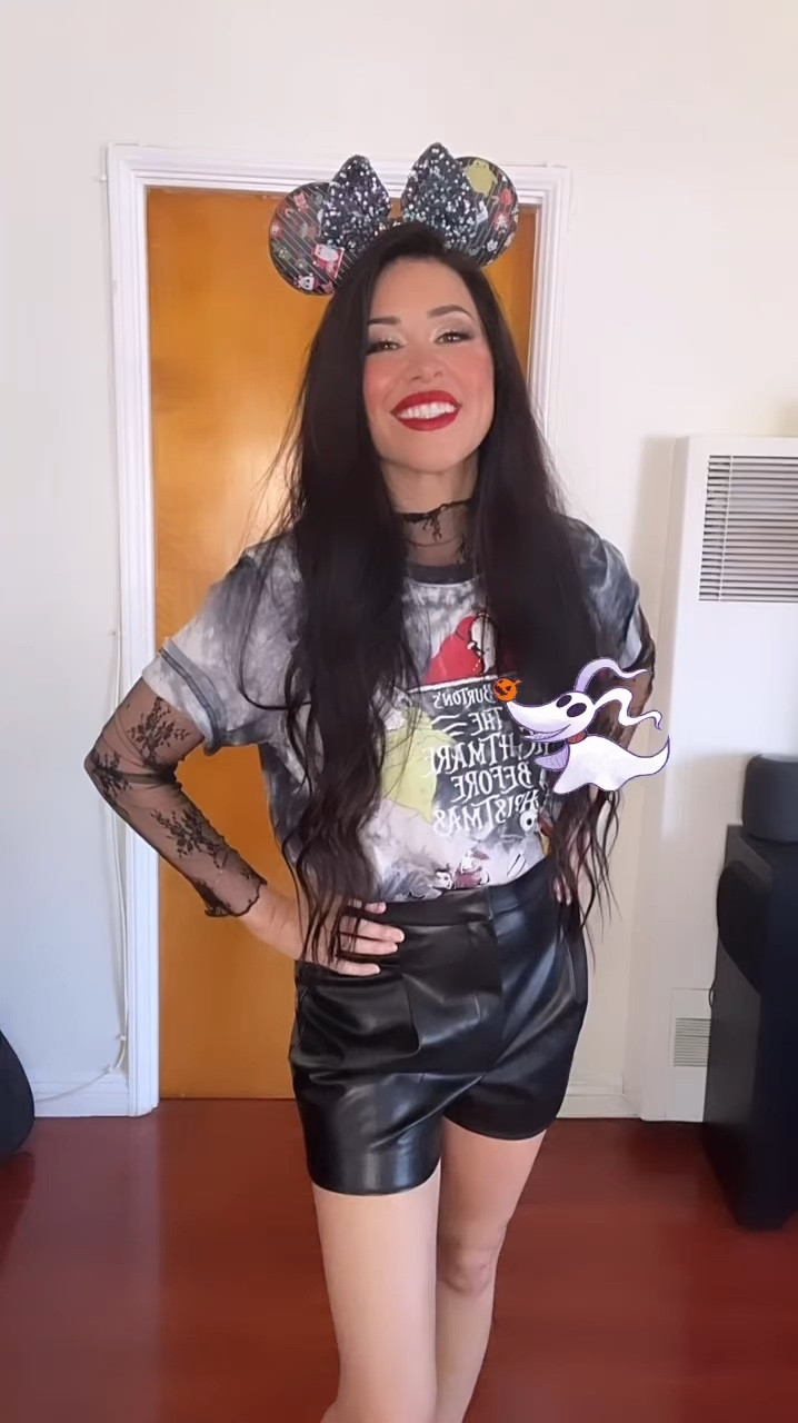 Outfit for Oogie Boogie in the summer heat! Layered this tie dye Nightmare Before Christmas T-shirt, with a mesh black lace top, paired with black high waisted pleated shorts! The Minnie Ears are Loungefly with a Nightnsre Before Christmas pattern! #DisneyOutfit #DisneyOutfitInspo #DisneyHalloweenOutfit 

#LTKSeasonal #LTKParties #LTKStyleTip