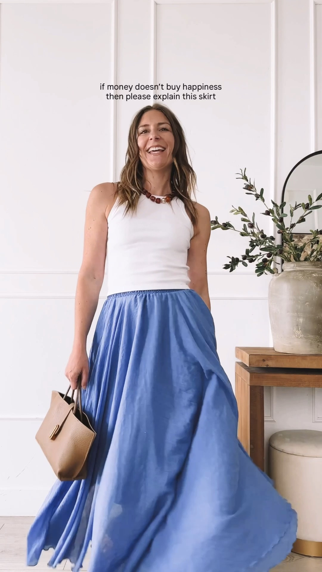 This entire outfit is an Amazon find and it’s my favorite easy summer look right now. The blue maxi skirt has the dreamiest flowy movement and pairs perfectly with a simple white tank, a beaded necklace, a structured tan bag, and tan sandals, all from Amazon too. It’s the kind of everyday outfit that looks elevated with zero effort, perfect for summer dinners, vacation, or just feeling put together at school pickup. Tap to shop the skirt, the tank, the necklace, the bag, and the sandals, everything is linked here for you.

#LTKootd #LTKmomlife #LTKgrwm