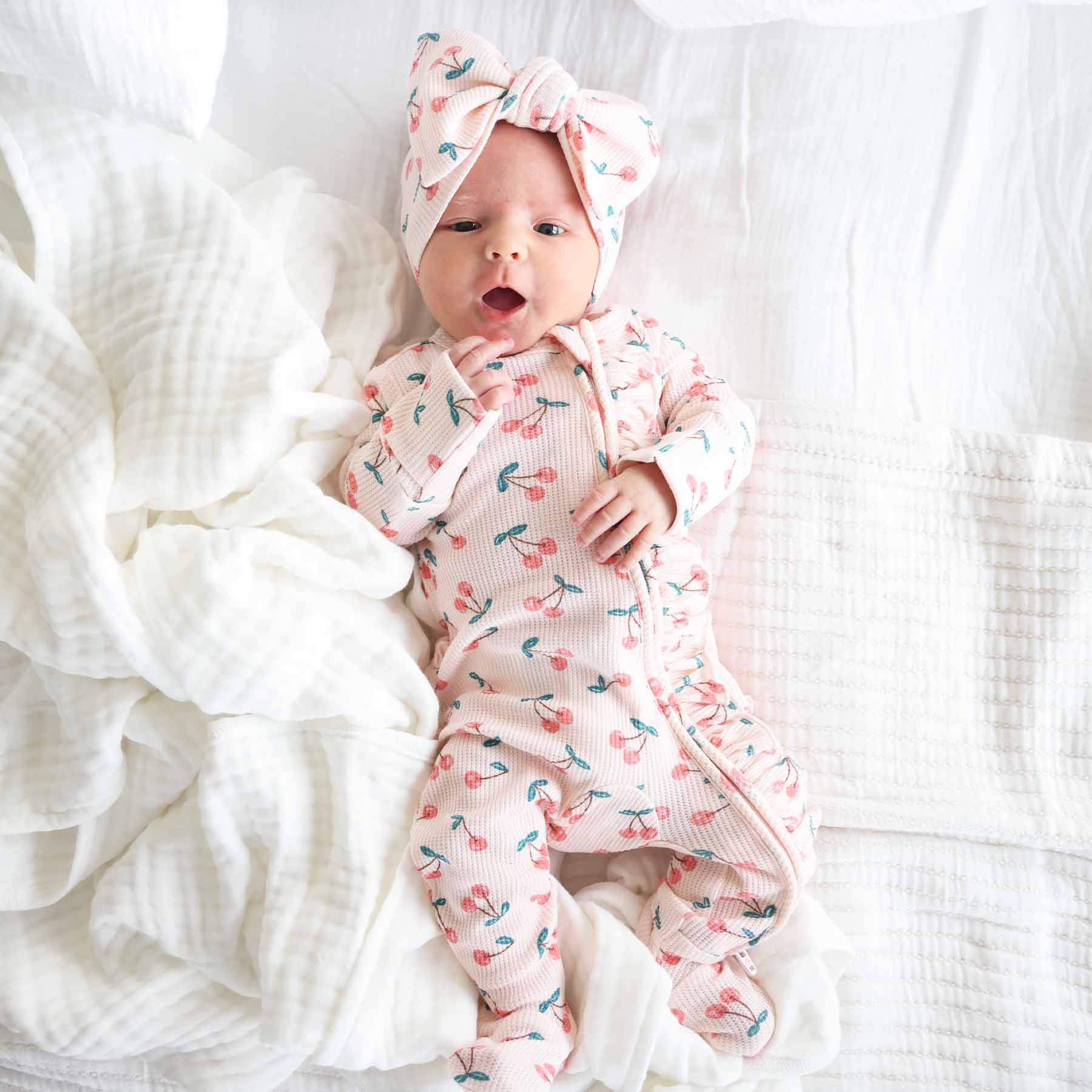 Cherry On Top Bamboo Waffle Zipper Ruffle Footie | Caden Lane