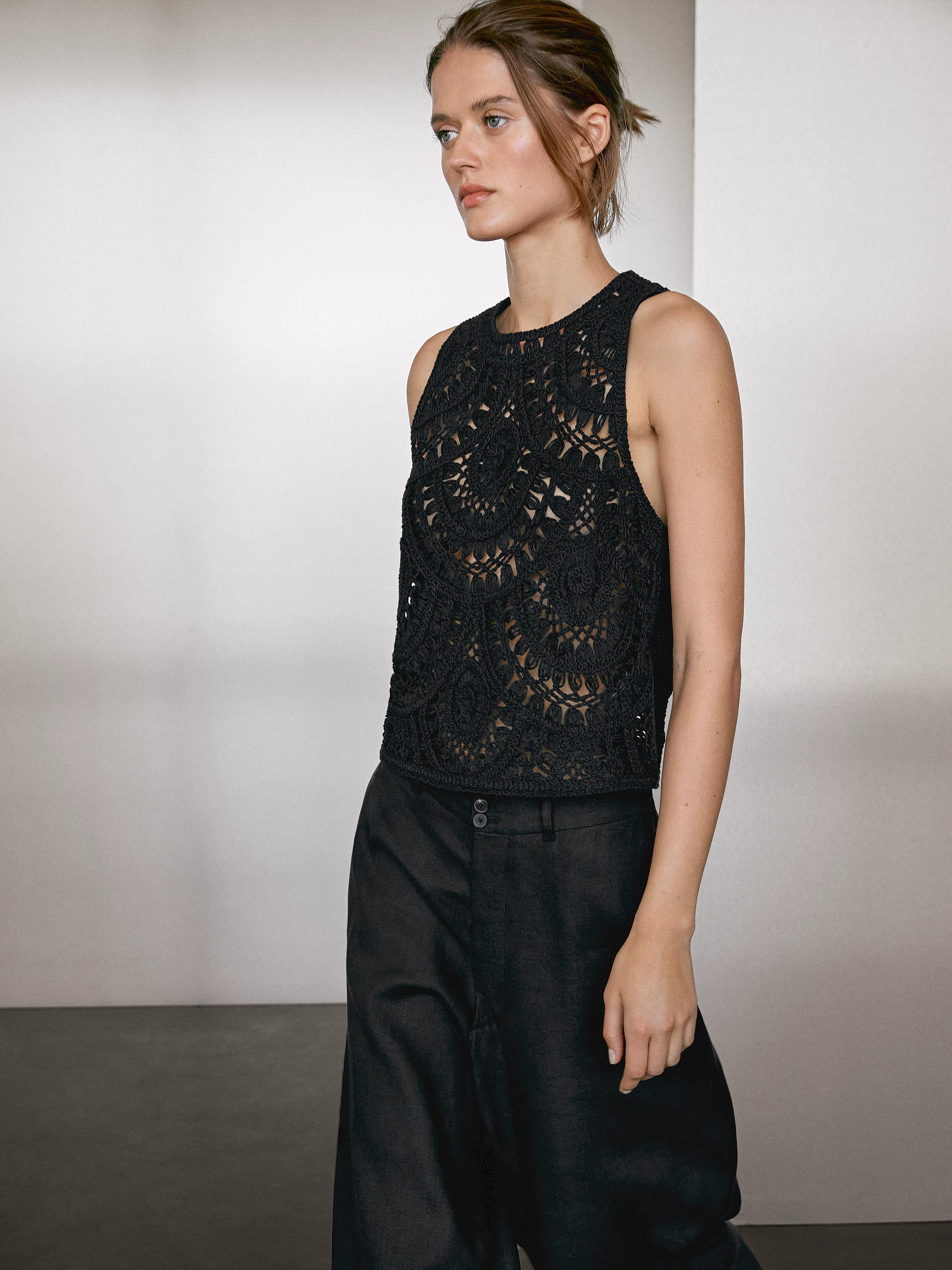 Top made of crochet-style fabric. Crew neck. Sleeveless. Back button fastening and teardrop openi... | Massimo Dutti US