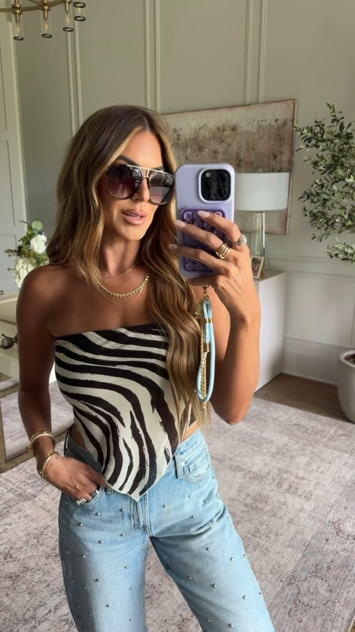 wearing a small top and 27 in jeans! 🦓  

 