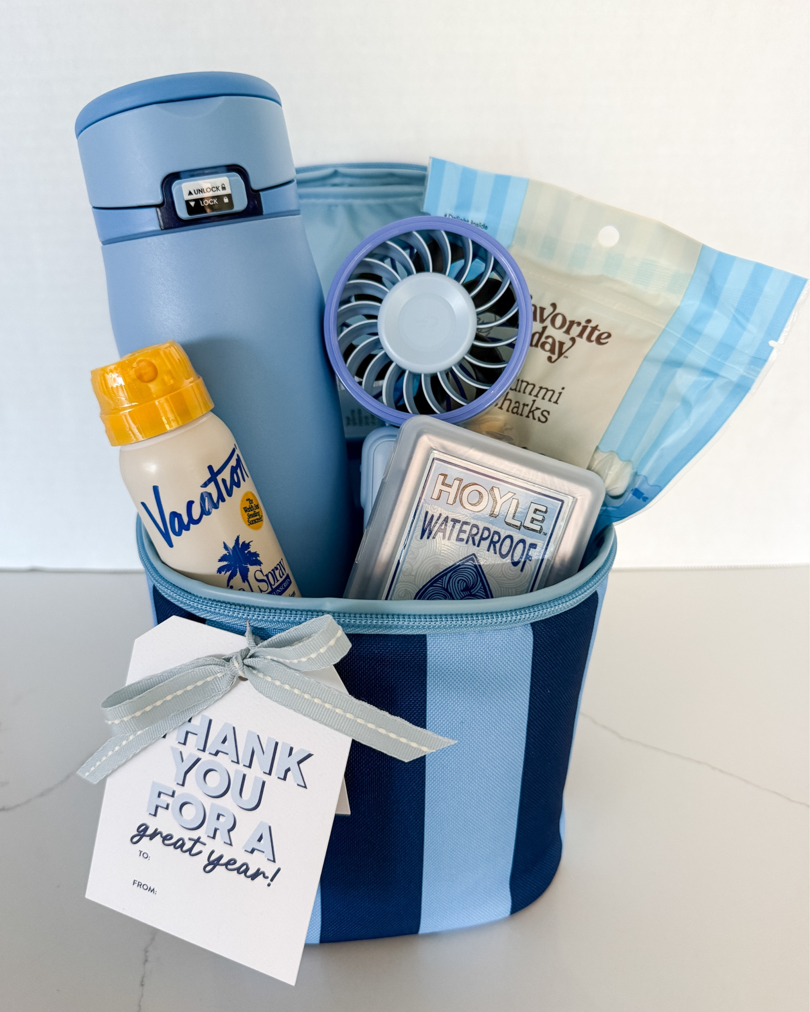 A "thank you for a great year" gift they'll actually use all summer long — this blue striped cooler packed with favorites is *chef's kiss* 💙 @Target 

 #teacherthankgou #summergiftideas

#LTKSeasonal