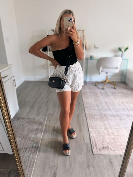 These $13 linen shorts! 🫶🏼🖤 so cute! I suggest sizing down one they run big, I did a small! 

Summer outfits 
Linen shorts 

#LTKMidsize #LTKStyleTip #LTKFindsUnder50