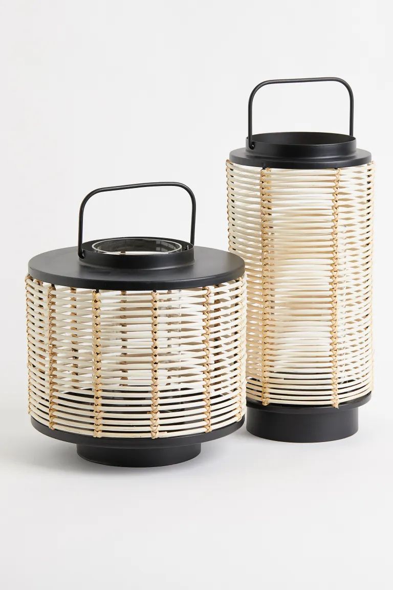 New ArrivalRound candle lantern in metal and rattan that allows light to shine through and create... | H&M (US + CA)