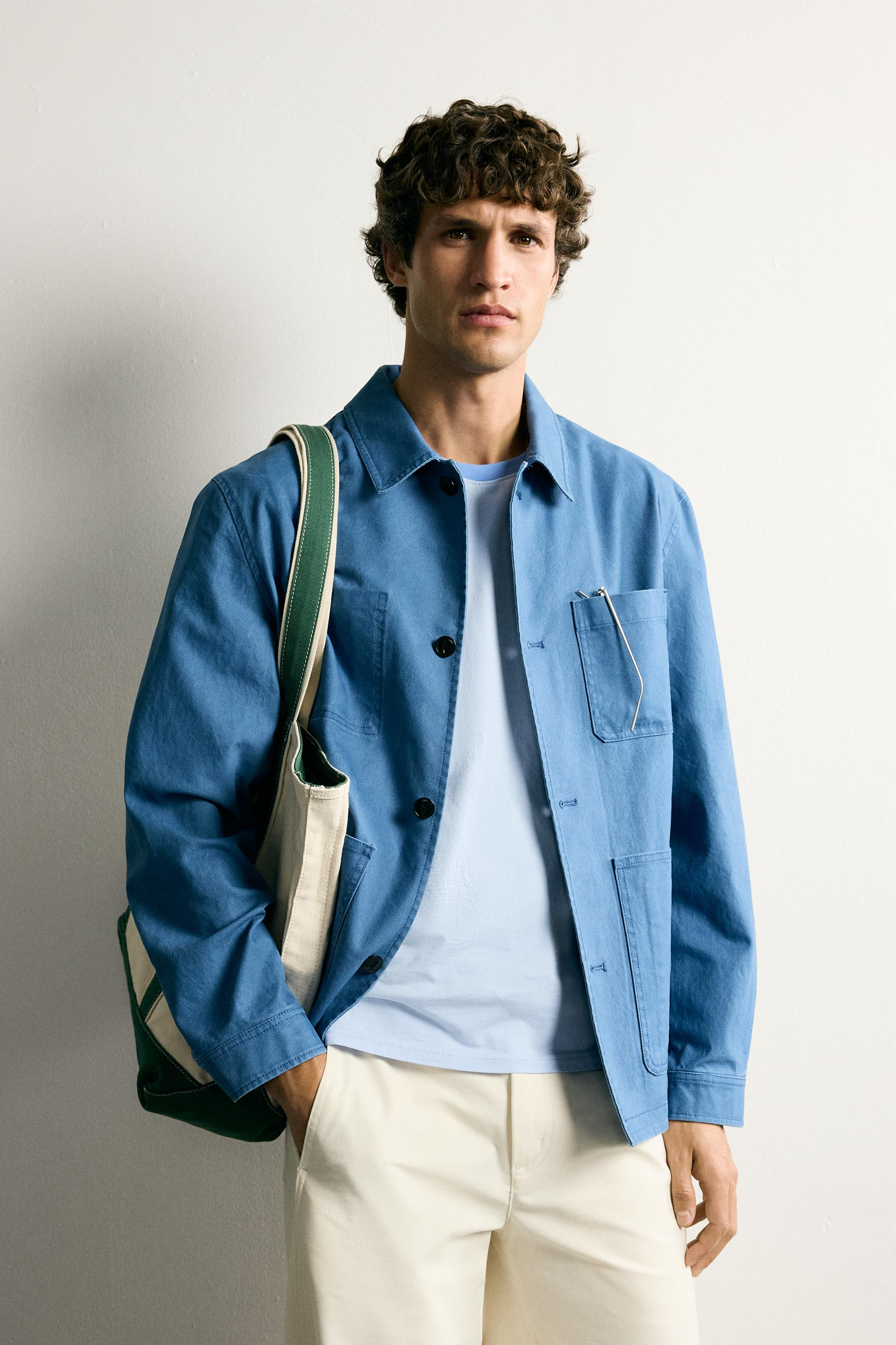 Regular fit overshirt made of cotton fabric. Lapel collar and long sleeves with buttoned cuffs. F... | Zara US