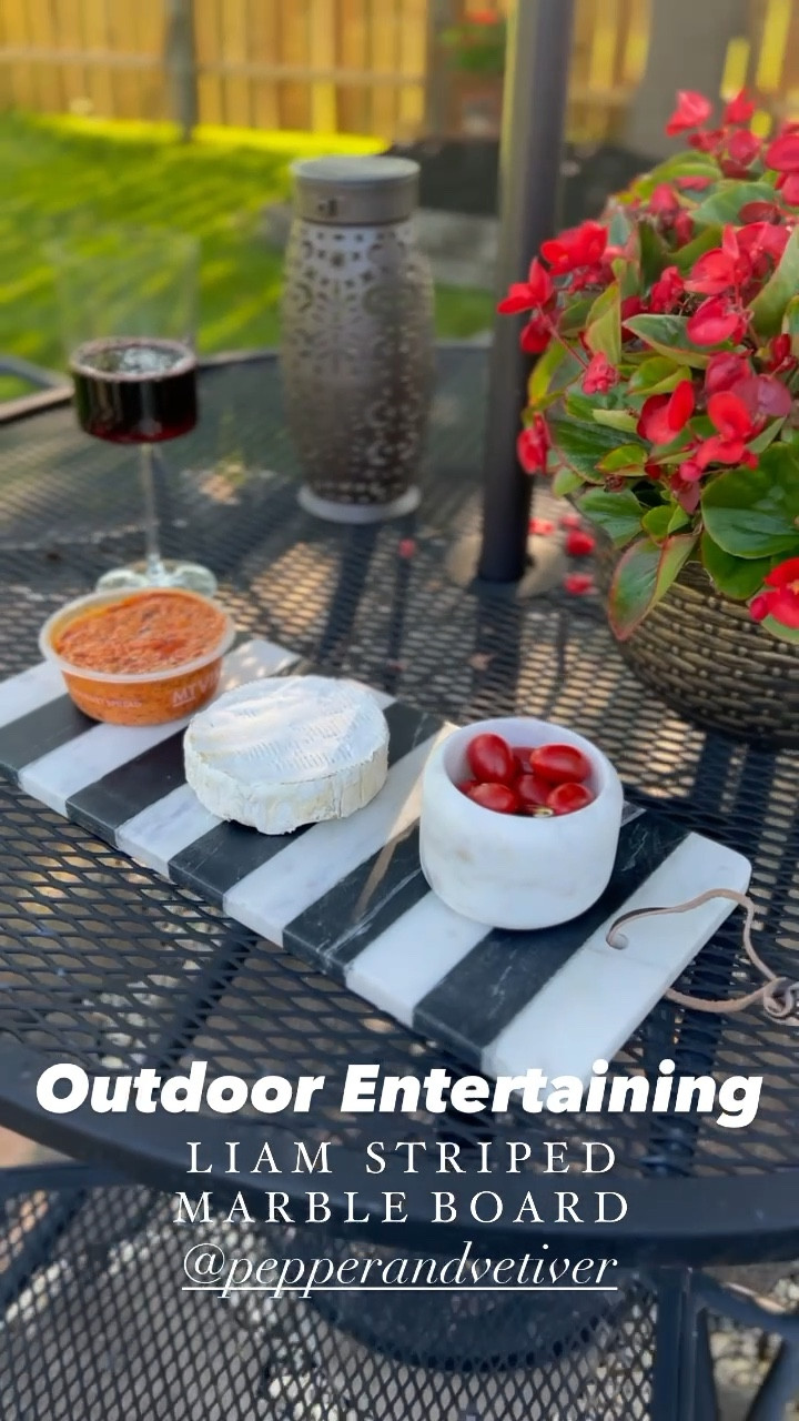 #ad I love my home products from Pepper & Vetiver for summer and fall home entertaining. They can double as serving ware as well as home decor! - I used the marble pinch pot for serving tomatoes, but it can also be used for salt on your kitchen counter - The Liam stripes marble board is perfect for serving appetizers or charcuterie! Plus it also doubles as a great decorative piece when you are done - outdoor entertaining - home entertaining - cheeseboard - charcuterie board a cutting board - favorite home products 

#LTKSeasonal #LTKhome #LTKunder100