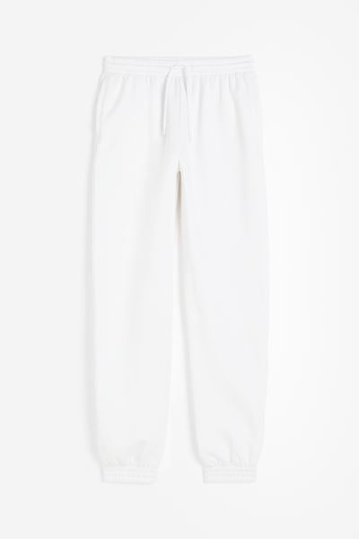 High-waisted joggers - White - Ladies | H&M GB | H&M (UK, MY, IN, SG, PH, TW, HK)