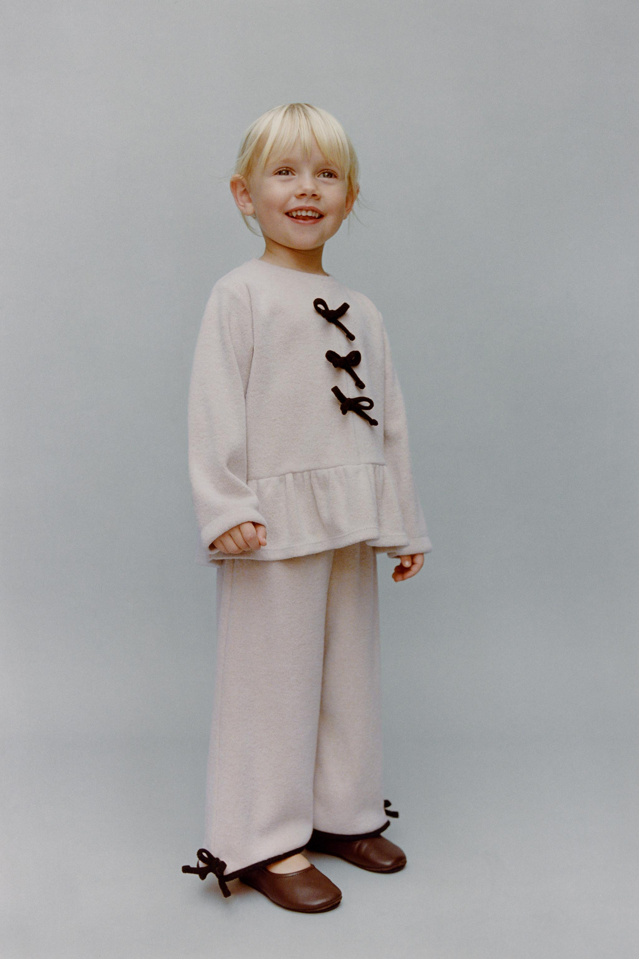 SOFT TOUCH T-SHIRT WITH CONTRASTING BOWS | Zara US