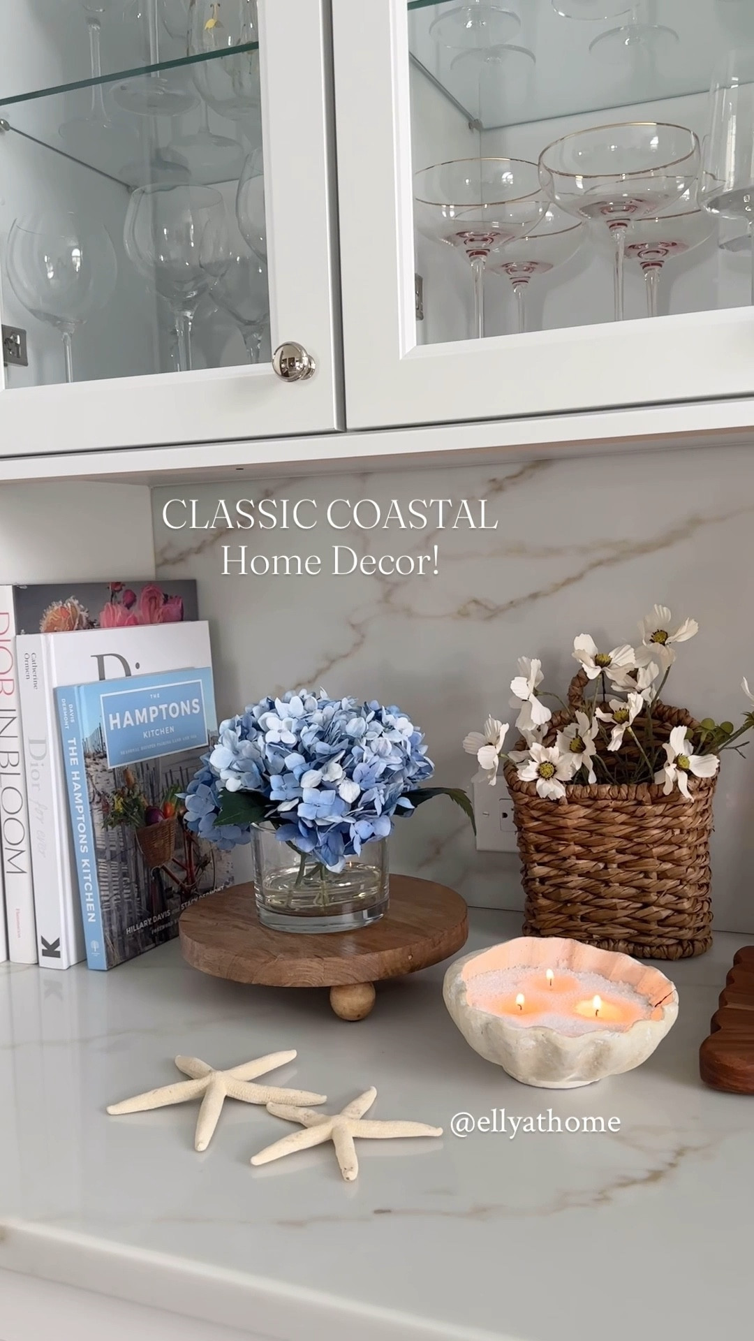 Classic coastal home decor styling! Shop hydrangeas arrangement, wood riser, shell candle, hurricane candle on sale, hanging basket, coastal artwork, plates, vases, scallop shade lamp, wineglasses, favorite books, florals, and more coastal decor. I’m waiting for the rattan candle to arrive!

#LTKHome #LTKSaleAlert #LTKMothersDay