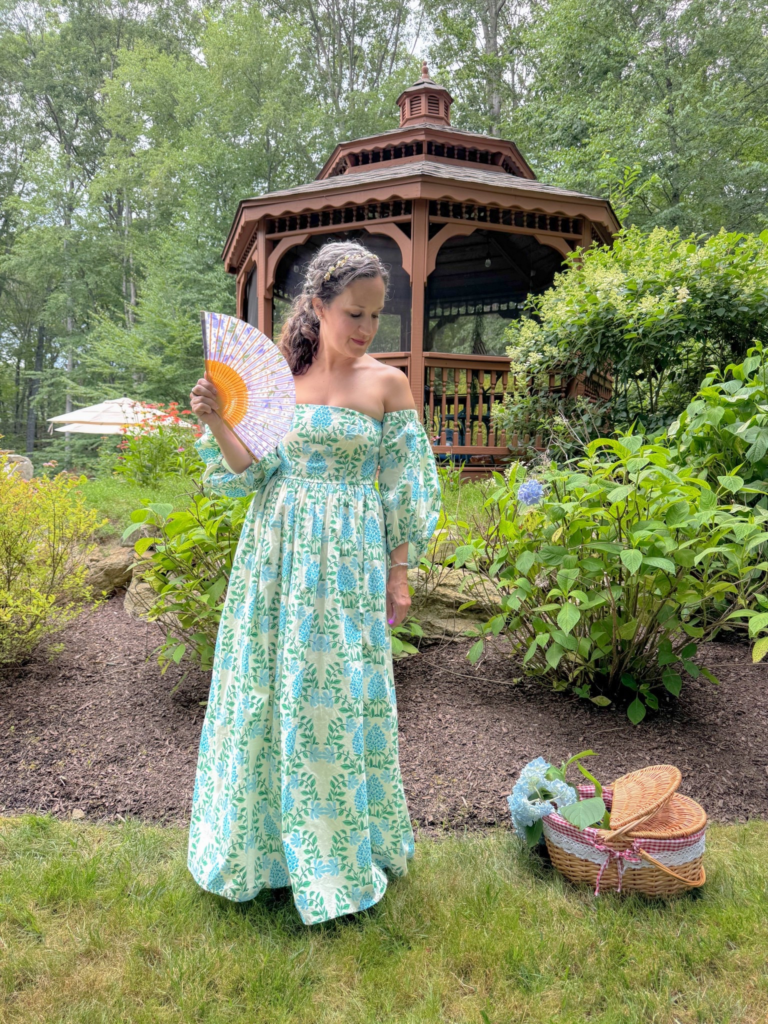 Feeling fancy in my yard 🩵 My dress is from Anthro last year. Whimsical dresses 👗 

#LTKPetite #LTKSeasonal #LTKOver40