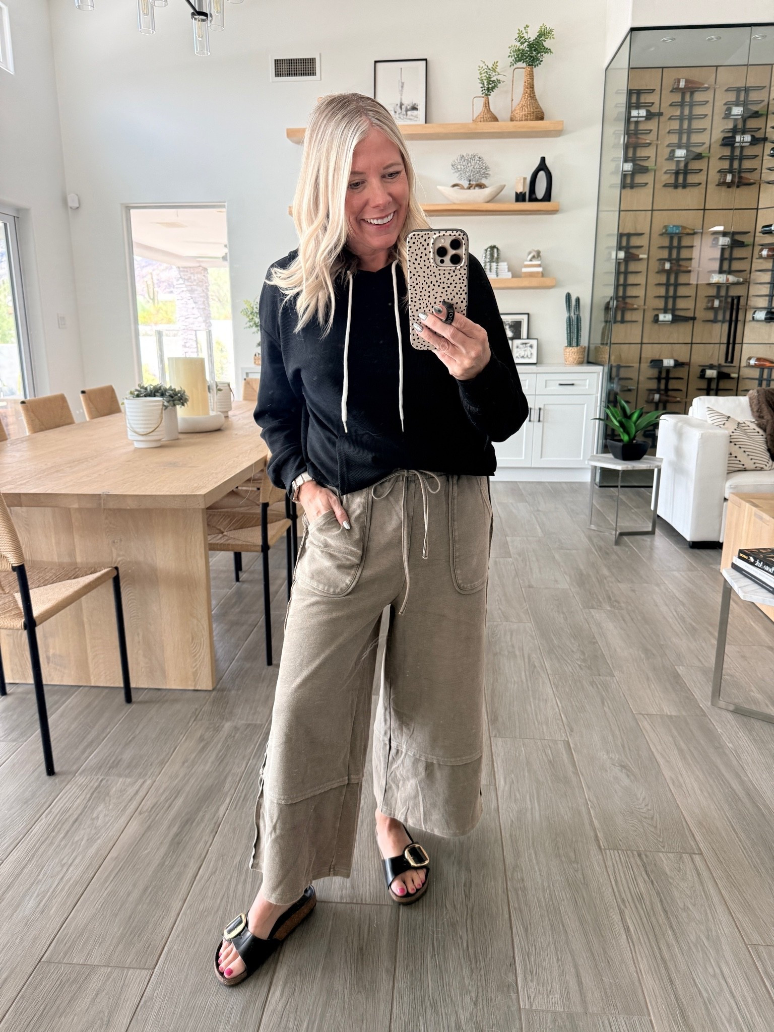Size small black waffle hoodie and olive cropped wide leg pants.

#LTKOver40 #LTKootd #LTKmomlife