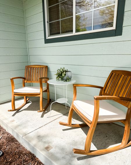 Affordable amazon find - teak wood rocking chairs with a white cushion! I’ve always wanted rocking chairs for our front porch  Got these for Mother’s Day and absolutely love them. Look so good with our mint green house too. 


#LTKSeasonal #LTKFamily #LTKHome