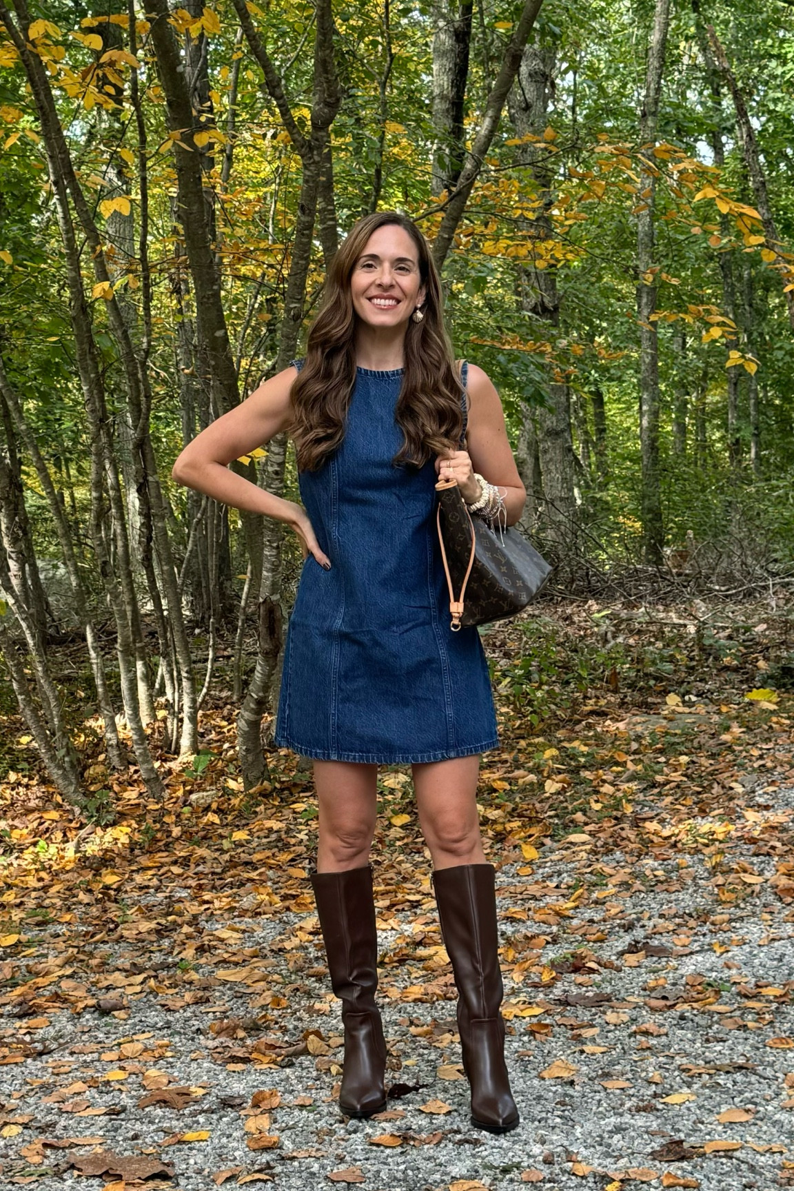 Loving this A-like mod sleeveless denim dress I scored on sale & it’s still on sale - & the boots are under $60 & I’m loving the chocolate brown accessories (matching here with my Louis Vuitton neverfull) for fall 🍂🍁

#LTKFindsUnder50 #LTKStyleTip #LTKSaleAlert