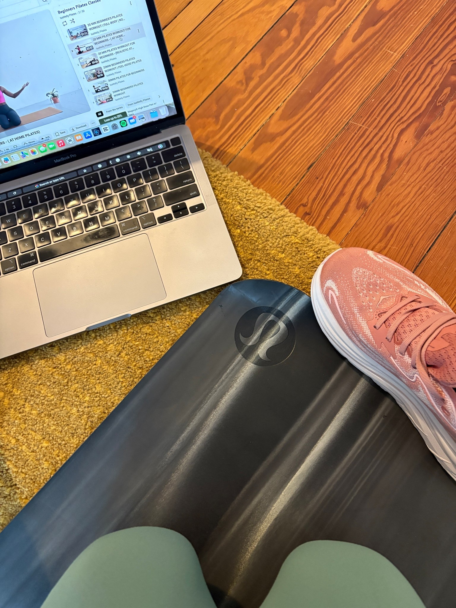 Another Pilates session down 💪🏻 

ID: looking at a mat on a yellow rug. There’s a sneaker holding it down and an open MacBook next to it  

#LTKActive #LTKfitnessgoals