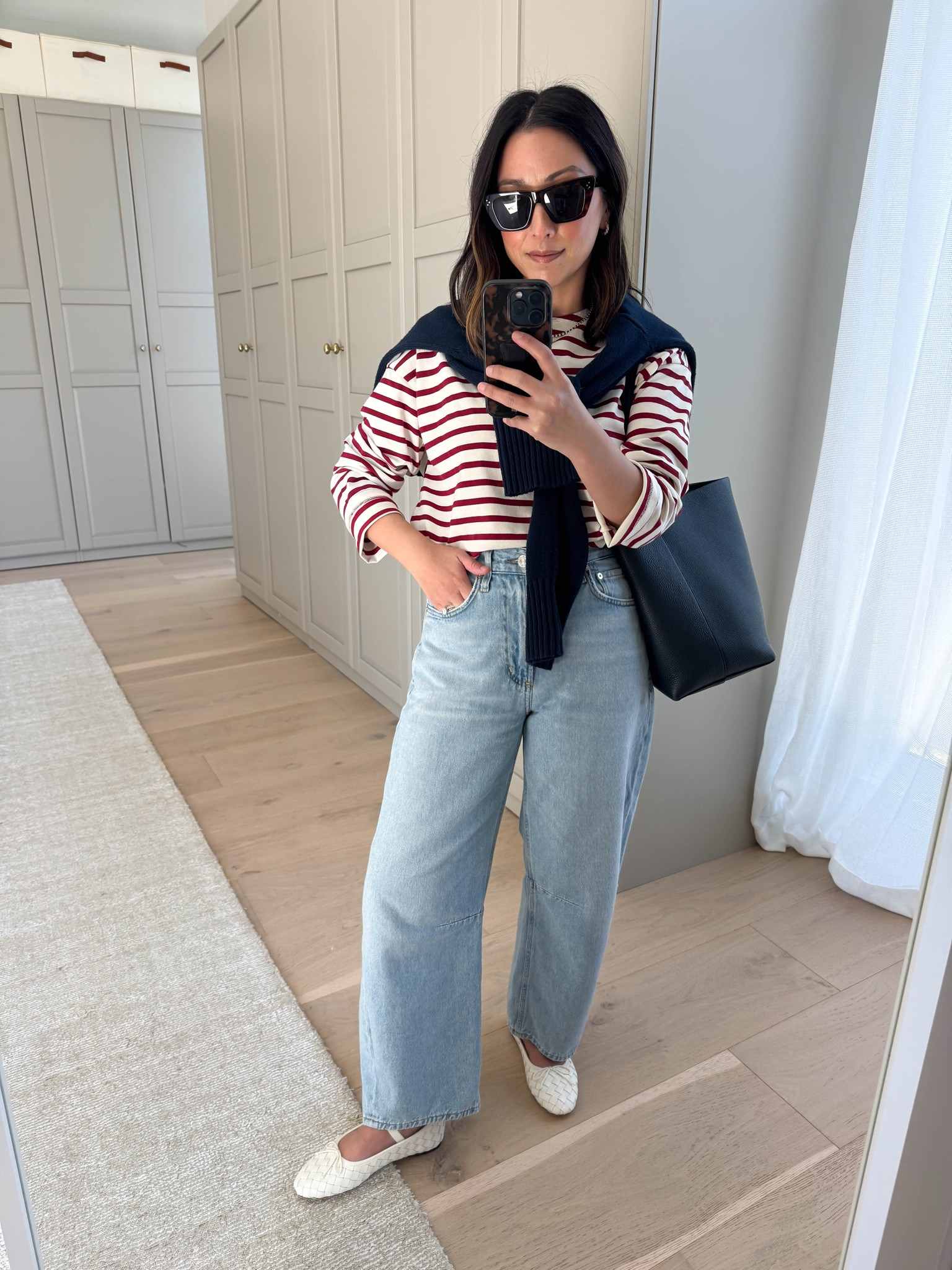 Citizens of Humanity Petite Miros review. This specific wash is butter soft - like sweatpants denim. Length is fantastic on petites! 

Tuckernuck stripe tee xs
Everlane cotton sweater xs
Citizens of Humanity Miro jeans 25 petite
Loeffler Randall flats 5.5
The Row bag navy small - linked similar
Celine sunglasses
Dorsey James necklace 15"
Electric Picks Daphne hoops

Petite style, spring outfits 2026

#LTKPetite #LTKmomlife