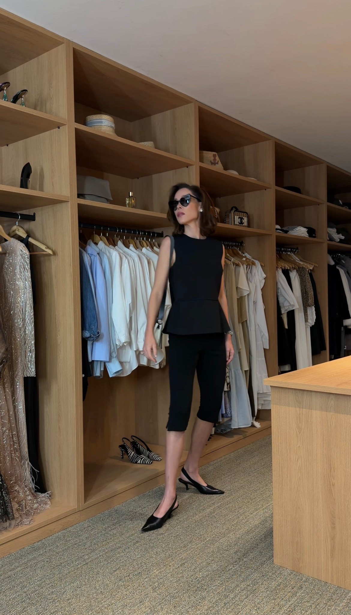 90s minimalist meets Italian dolce vita.
A sleek black set, kitten heels and sharp sunglasses — the kind of effortless look that always feels chic. Simple, timeless and easy to recreate for everyday elegance.

Shop this minimalist outfit: black sleeveless top, tailored capri pants, kitten heels, classic sunglasses and a structured mini bag.

#LTKspring #LTKeurope #LTKfrance