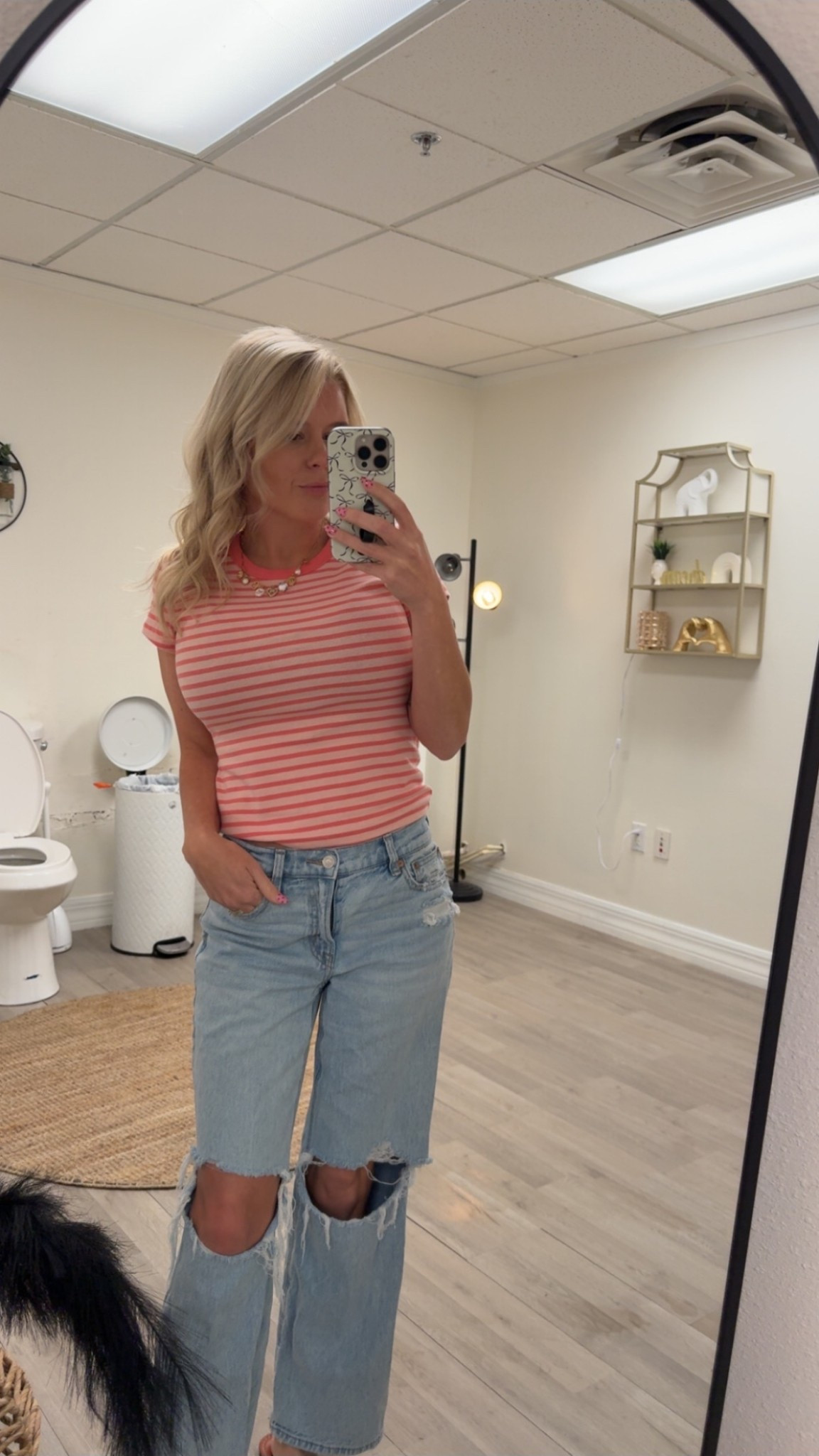 Wearing a small top, 0 in jeans 