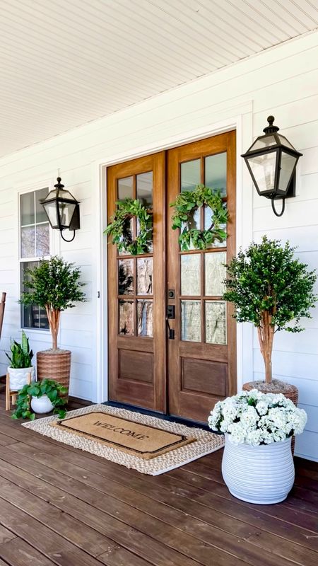 30% off sale! Front porch and front door decor trending viral home decor artificial faux plants trees flowers florals greenery faux geraniums hydrangeas doormat and jute scatter rug layered double modern farmhouse southern porch eucalyptus tree African sunflower wreath lantern, outdoor light fixtures, wall sconces lighting jute rug is 4x6  and doormat is 2x5 spring and summer home decor

#LTKhome #LTKSeasonal #LTKstyletip
