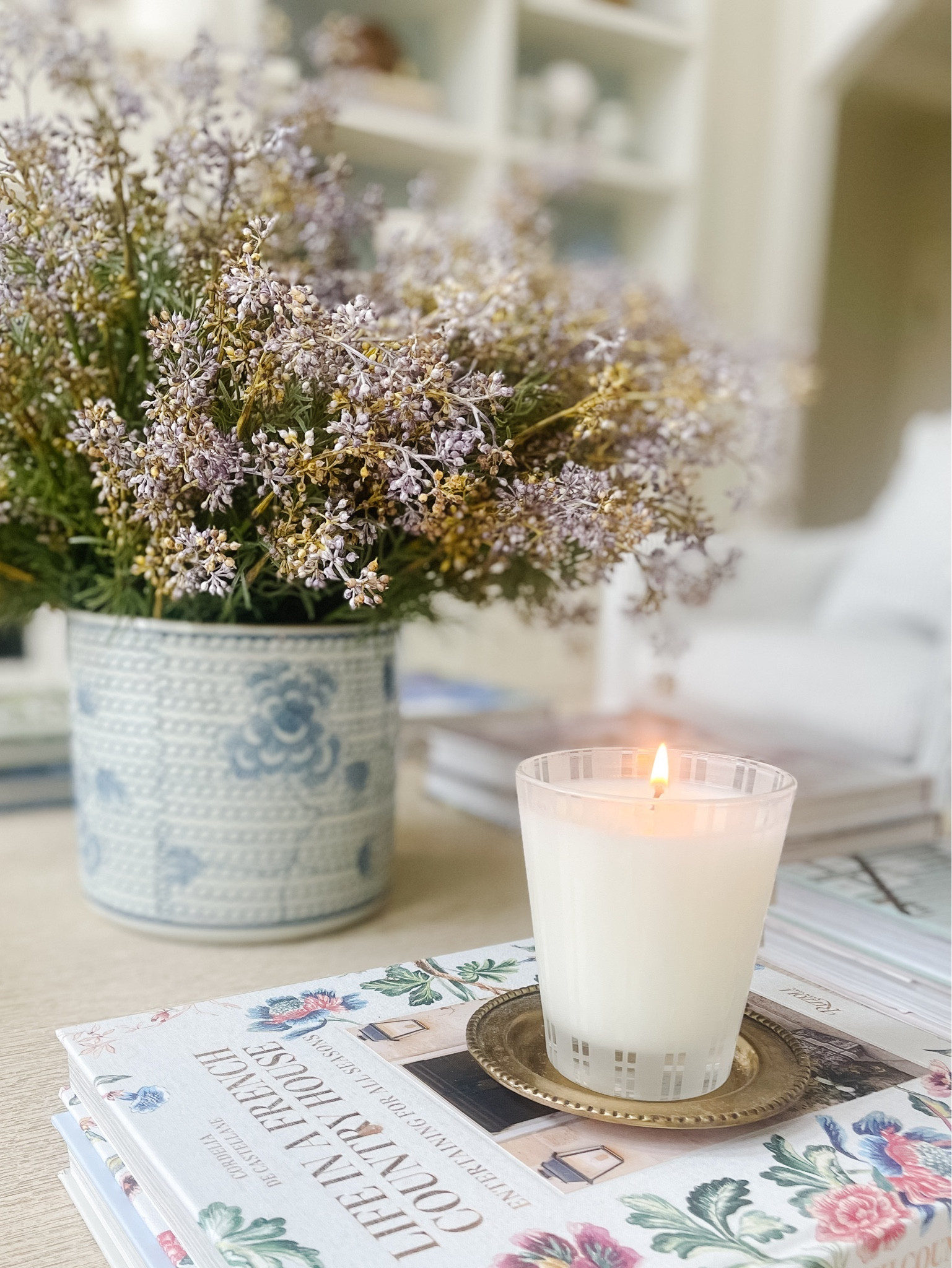 Faux flowers in blue and white vase, favorite home candle signature scent 

#LTKhome