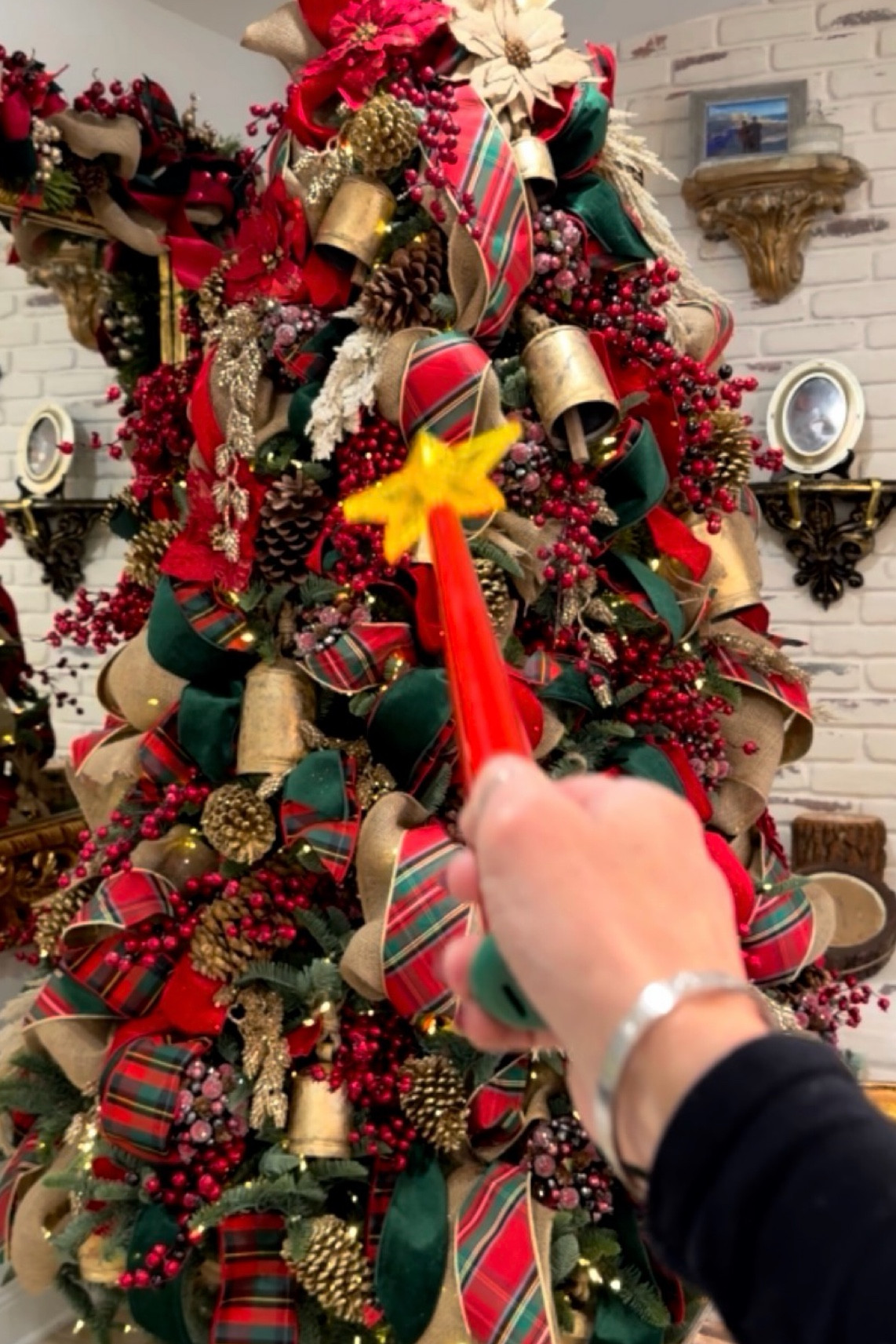 This magical one turns the tree lights on and off. It also comes with options to play music. Perfect for indoor and outdoor use.  ✨🪄

#LTKFamily #LTKHome #LTKHoliday