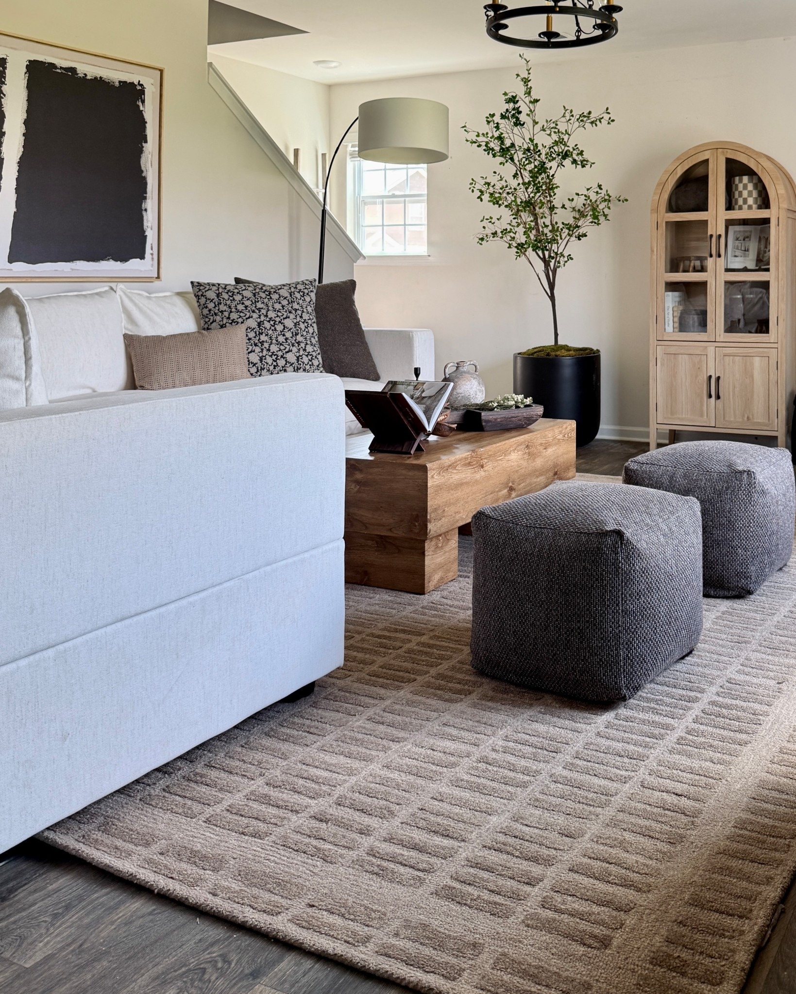 New rug and it’s on sale!! The perfect earthy brown taupe and super thick wool 🤌🏼 
Loloi Bradley cocoa, earthy rug, organic modern living room, brown rug, oak arched cabinet, Amazon home decor

#LTKHome #LTKSaleAlert